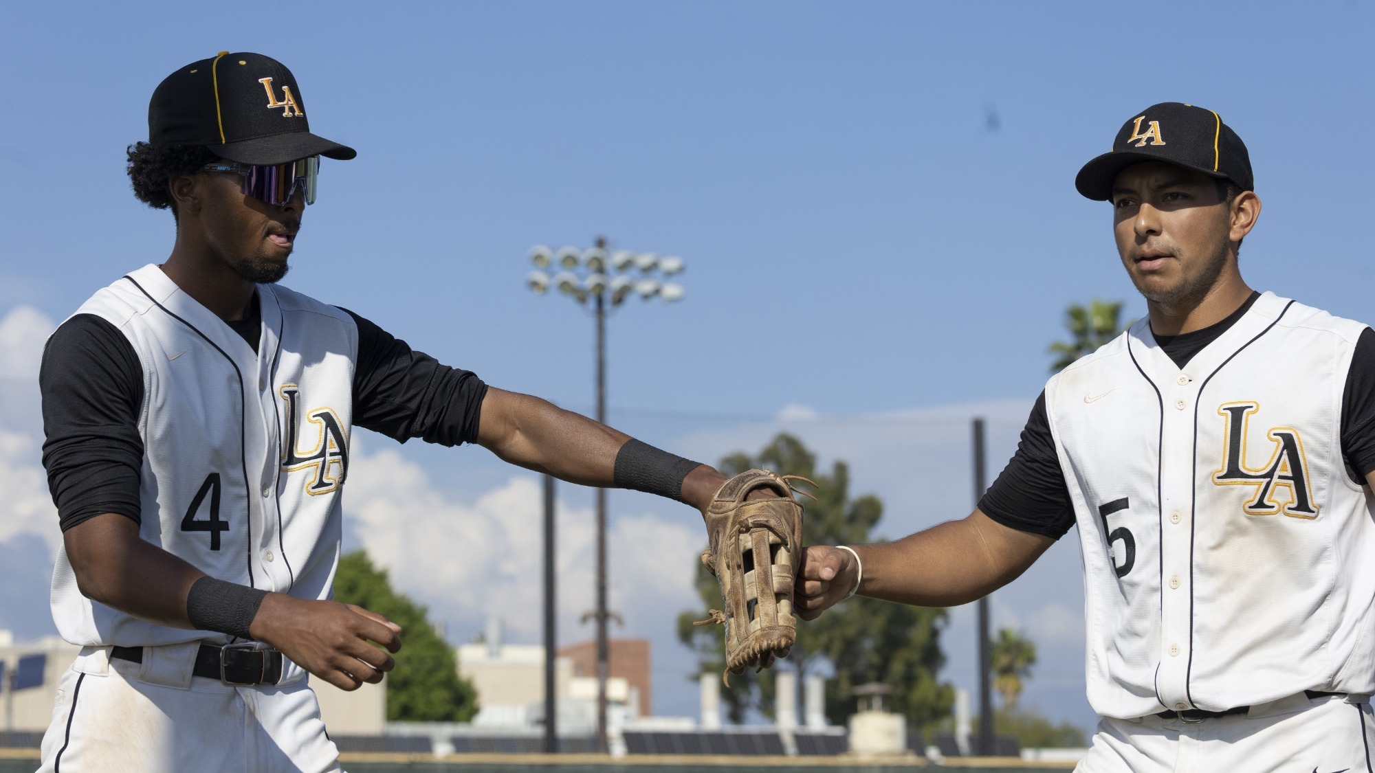 kadyn victorian and alberto prado come off the field