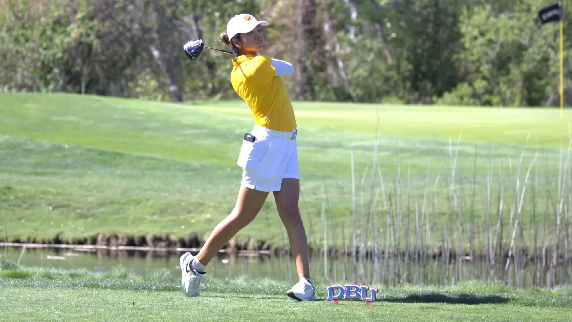 joshlyn ayala hits off the tee in patriot invitational on Monday