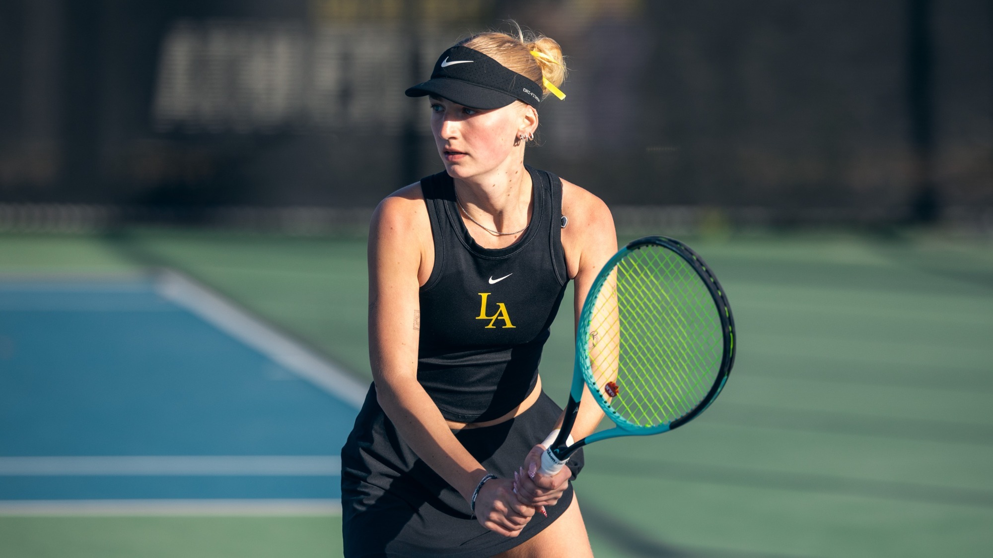 georgiana parr gets ready to hit a backhand