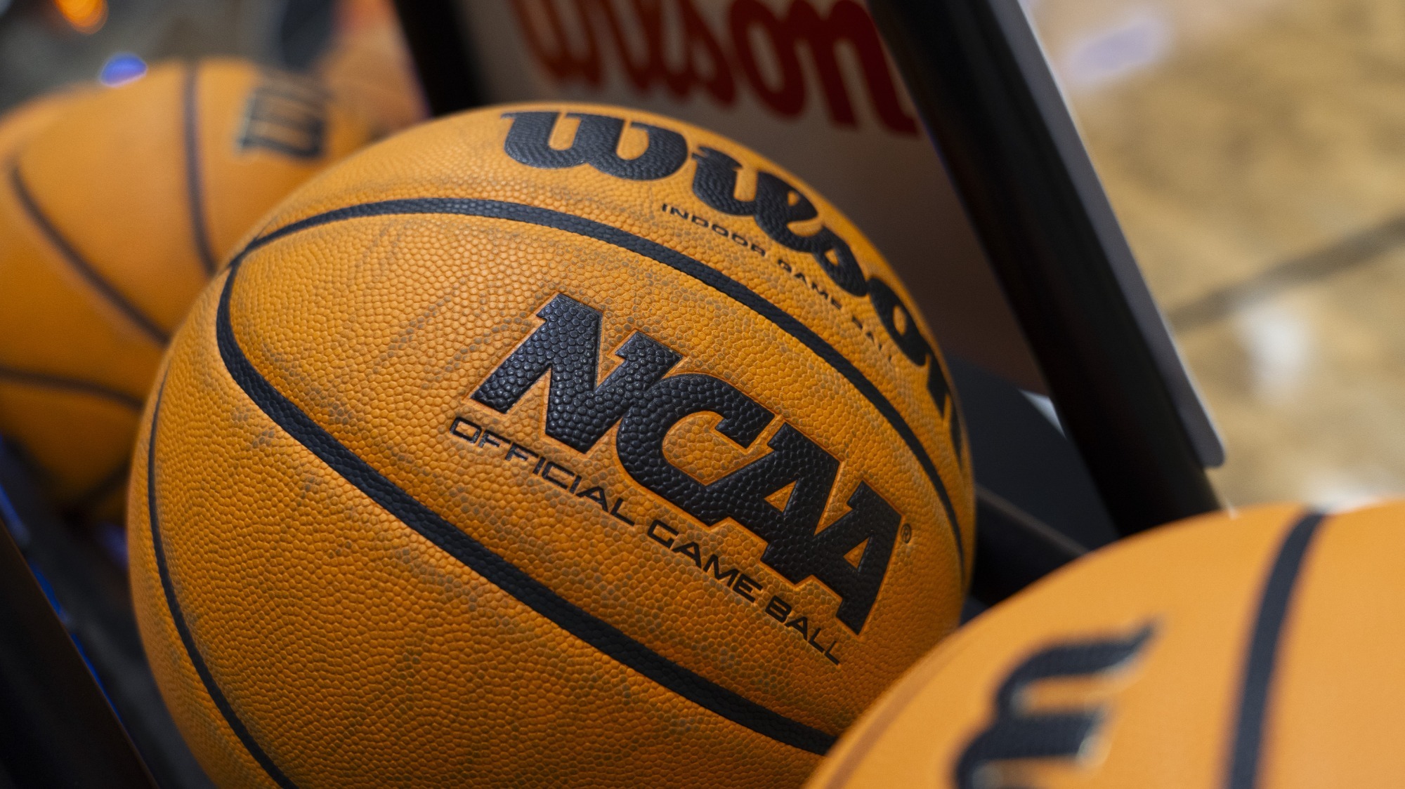 basketball sits on a ball rack