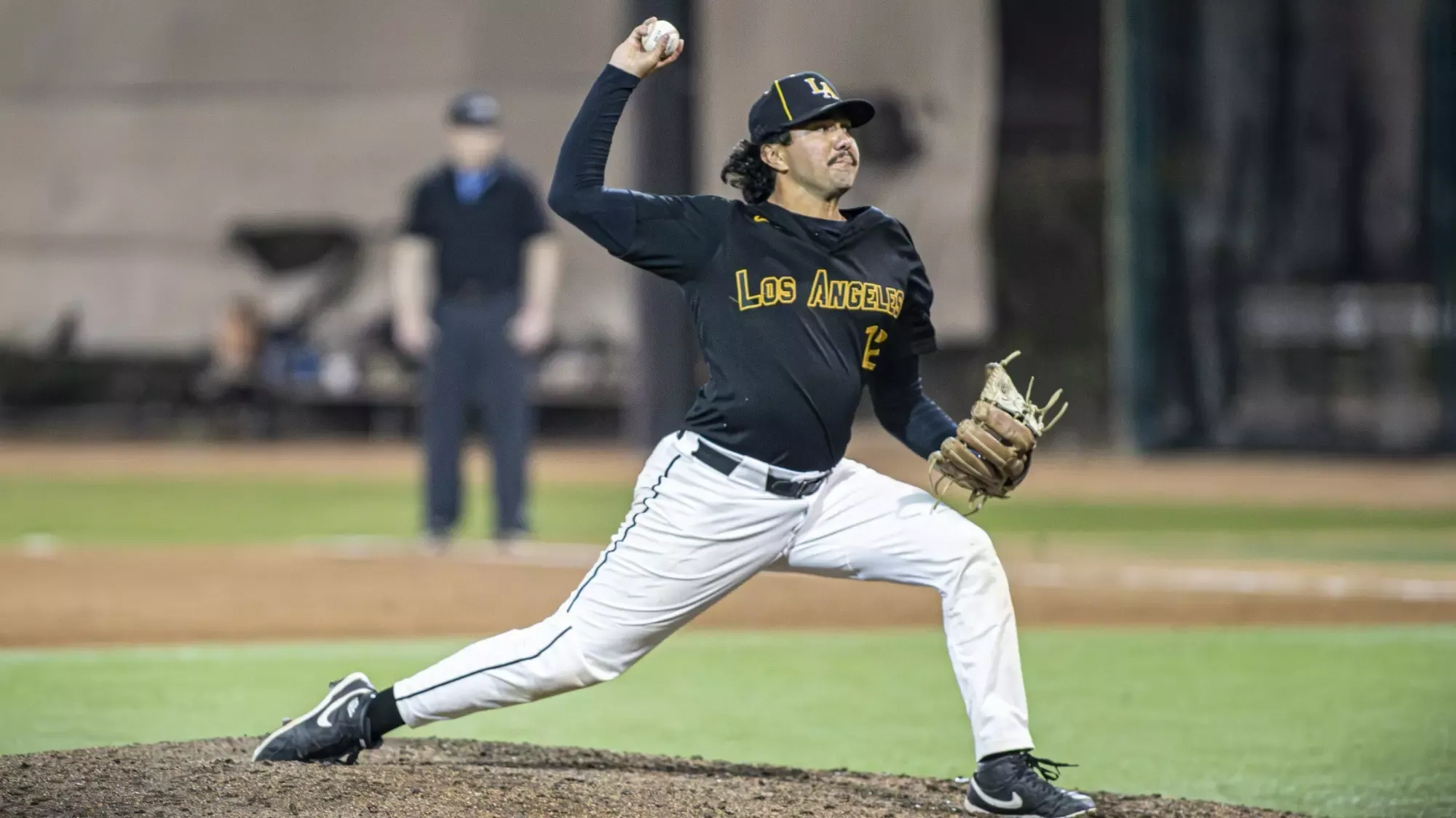 alejandro huezo fires a pitch home against chico state