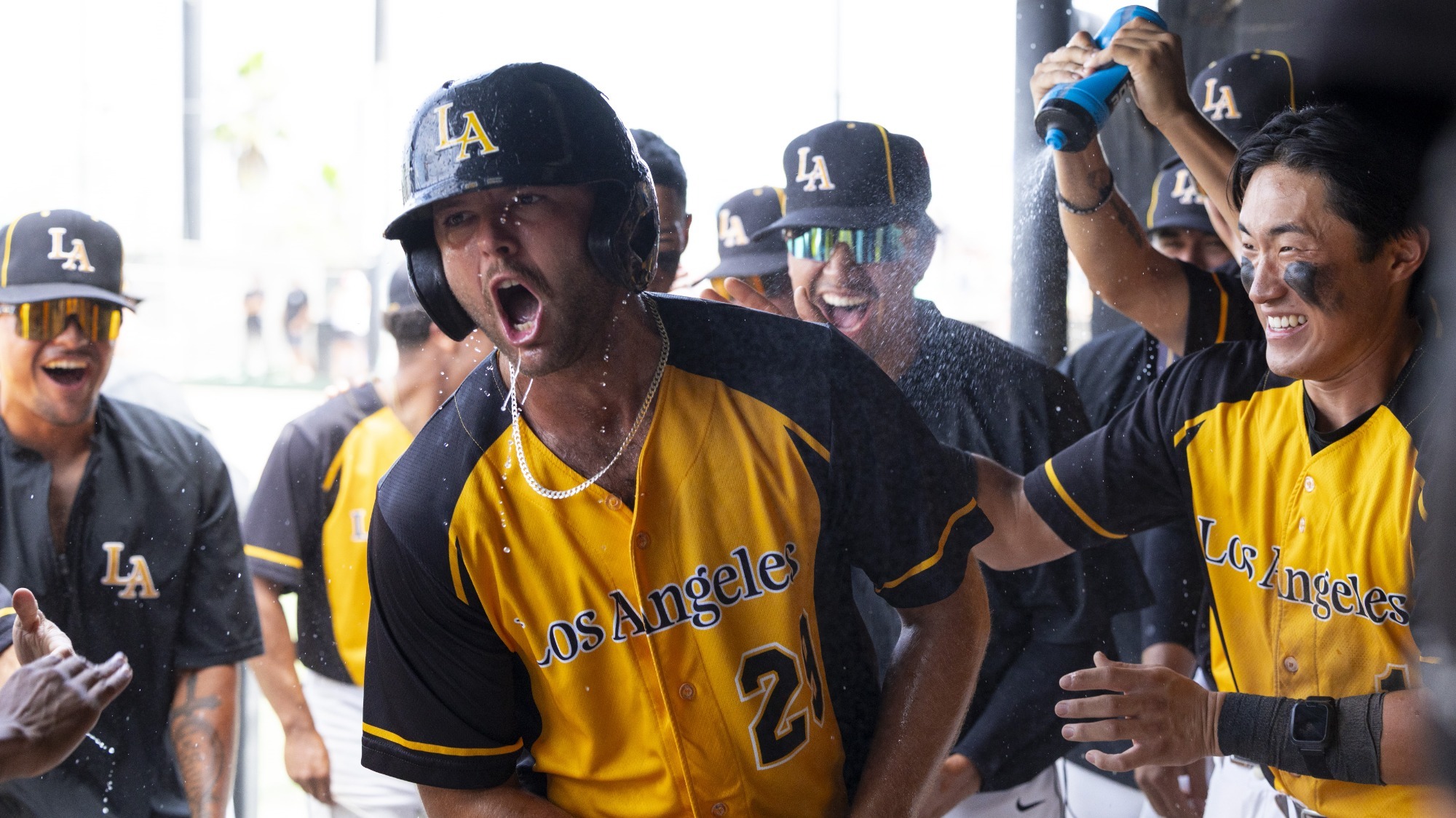 adam axtell gets soaked after hitting go-ahead three-run home run on sunday