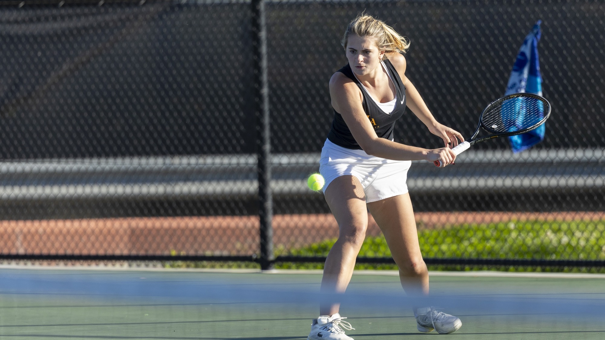 maldini simic hits a backhand return