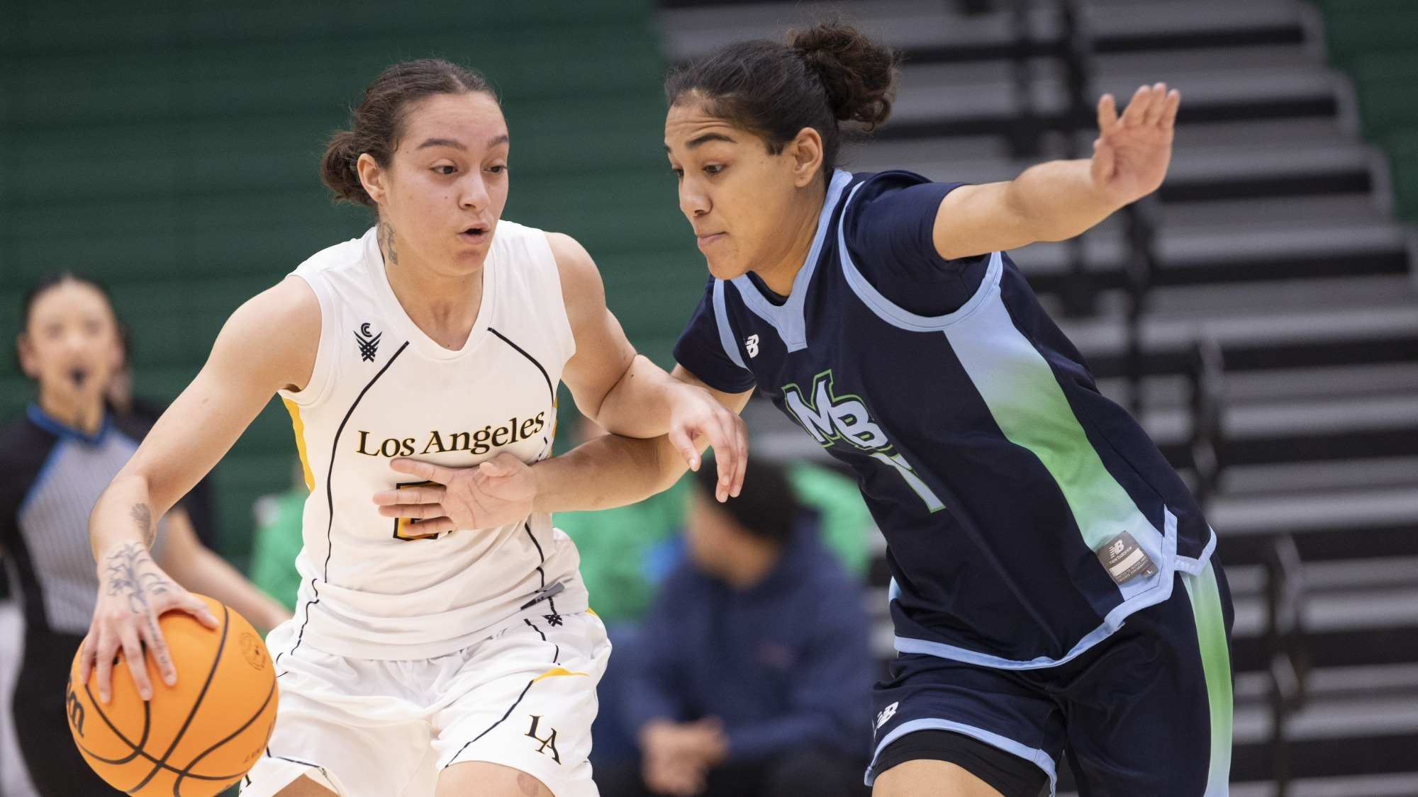 sofia fidelus drives against a monterey bay defender