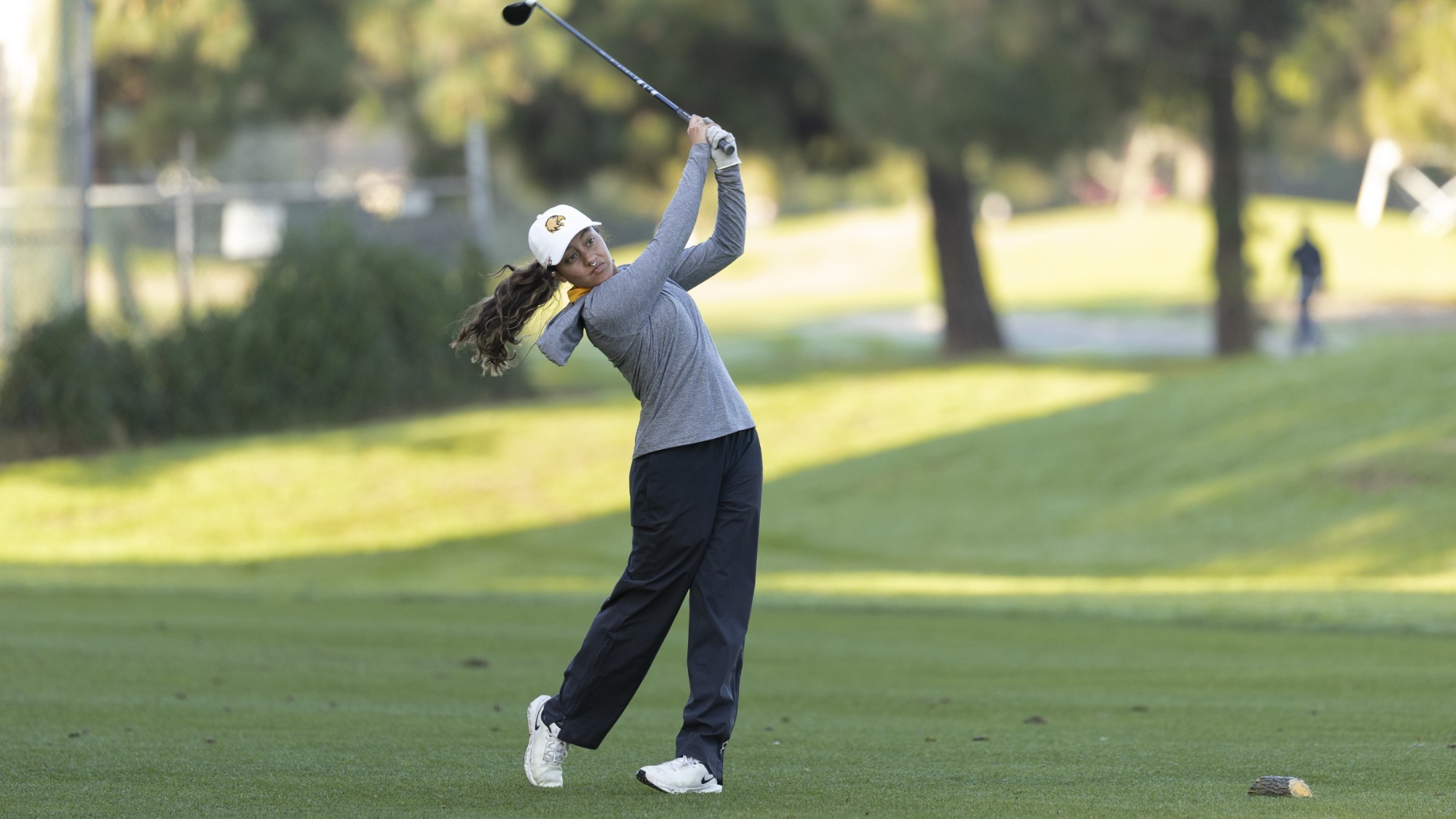 sarah amaya hits a golf shot