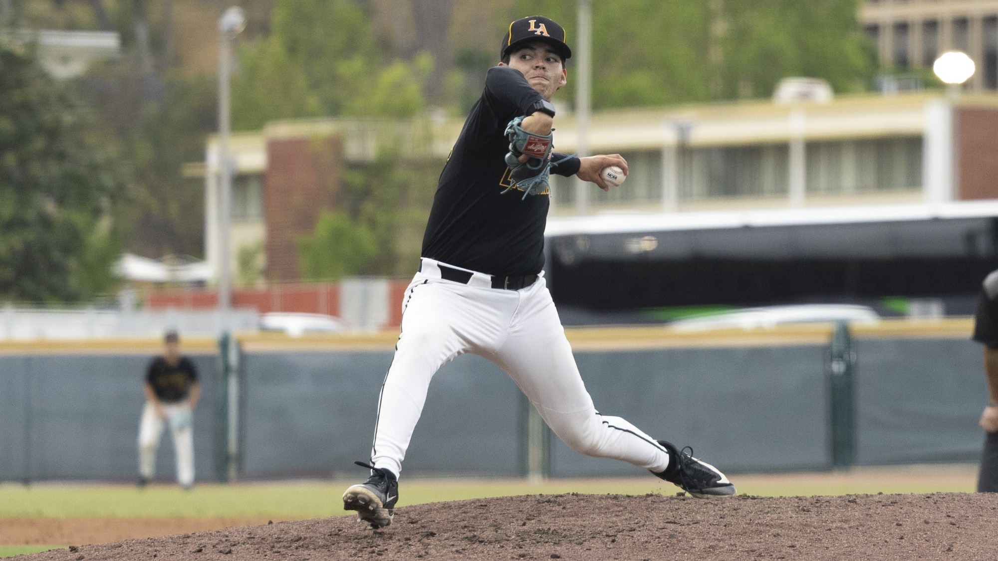 ismael quintero fires to the plate at reeder field