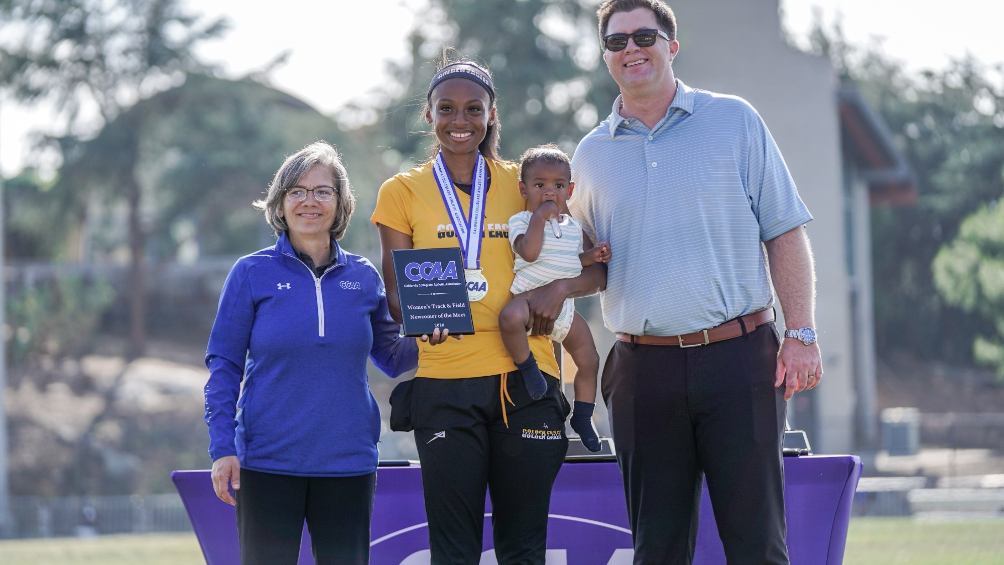 summer stevenson is presented Newcomer of the Meet award