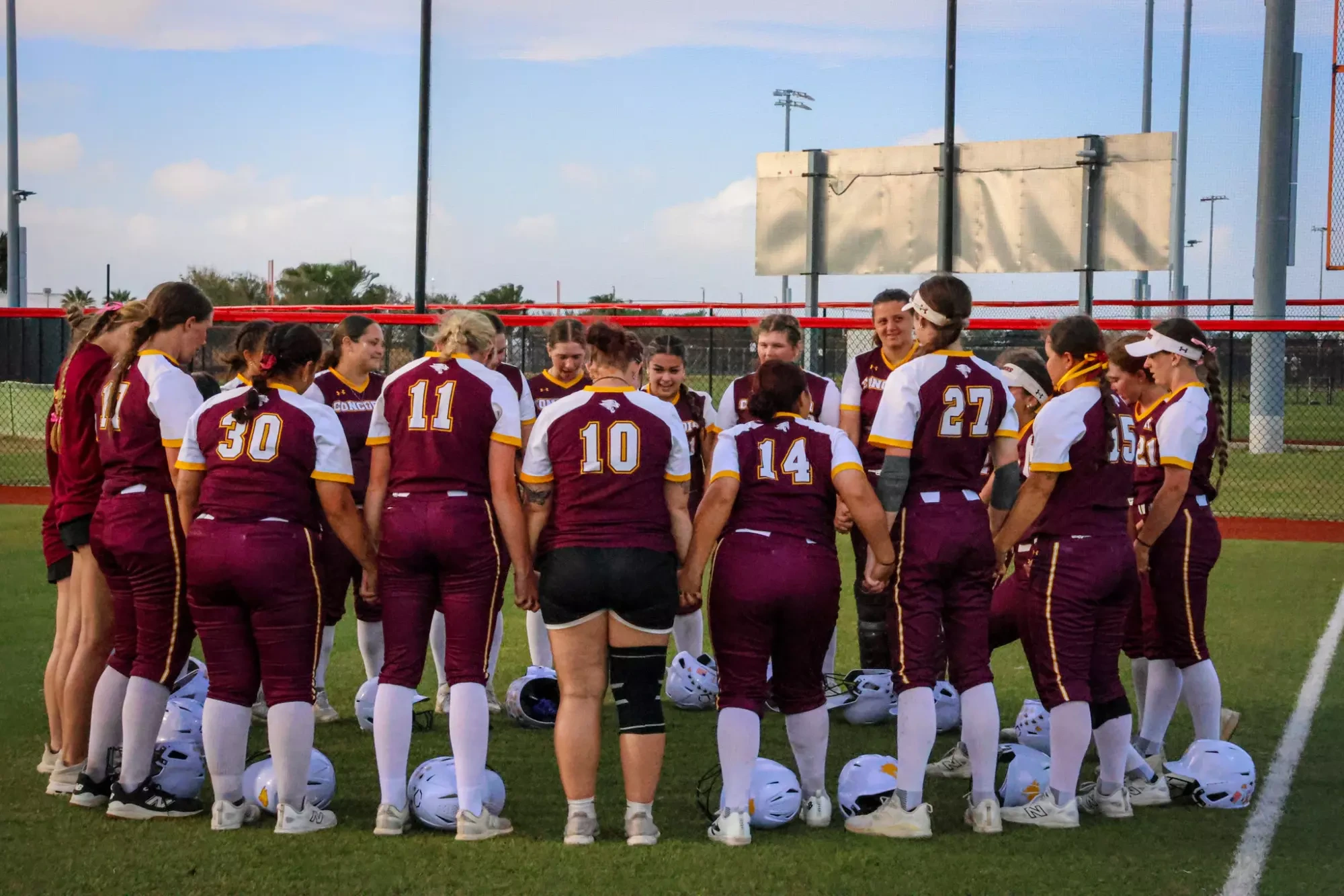 Softball Team Huddle