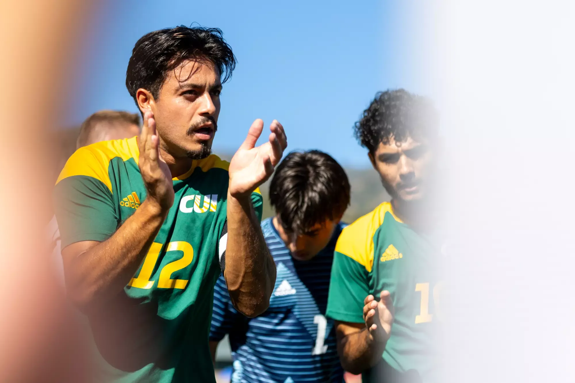 Domenyk Jara clapping in huddle at Westmont 2025