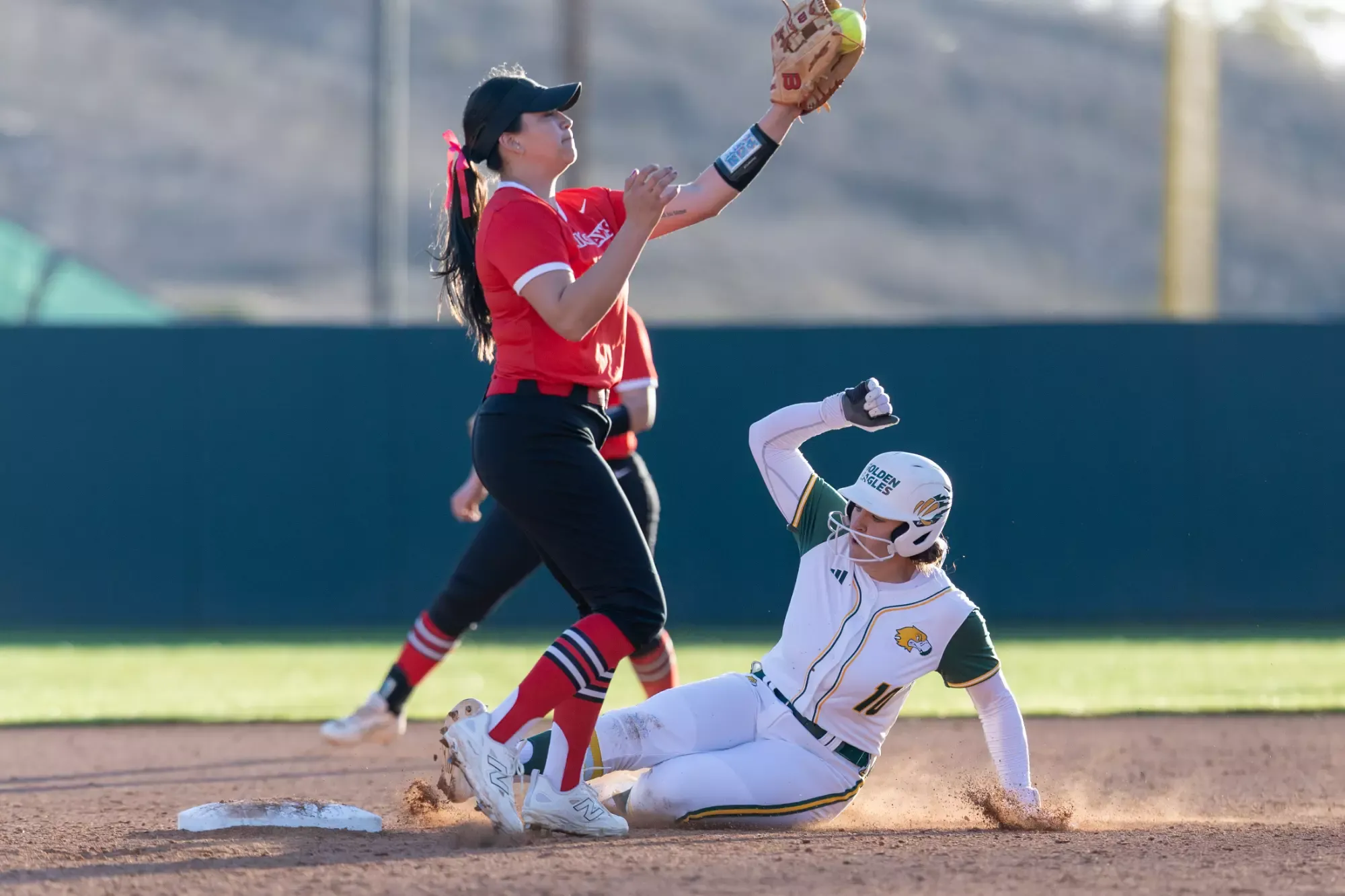 Kayla Rodgers sliding safely in for a steal