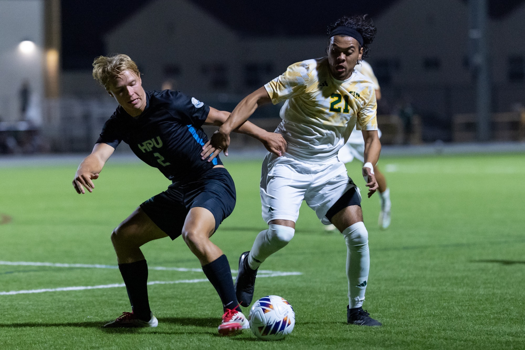 Bryan Maldonado battling for the ball vs HPU in a 2026 match