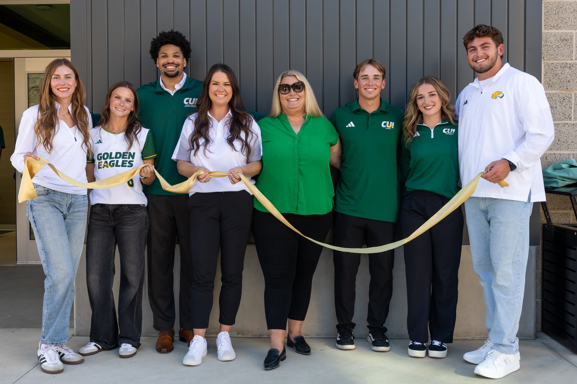 CUI Athletics Admin and SAAC Student Leaders Ribbon Cutting picture