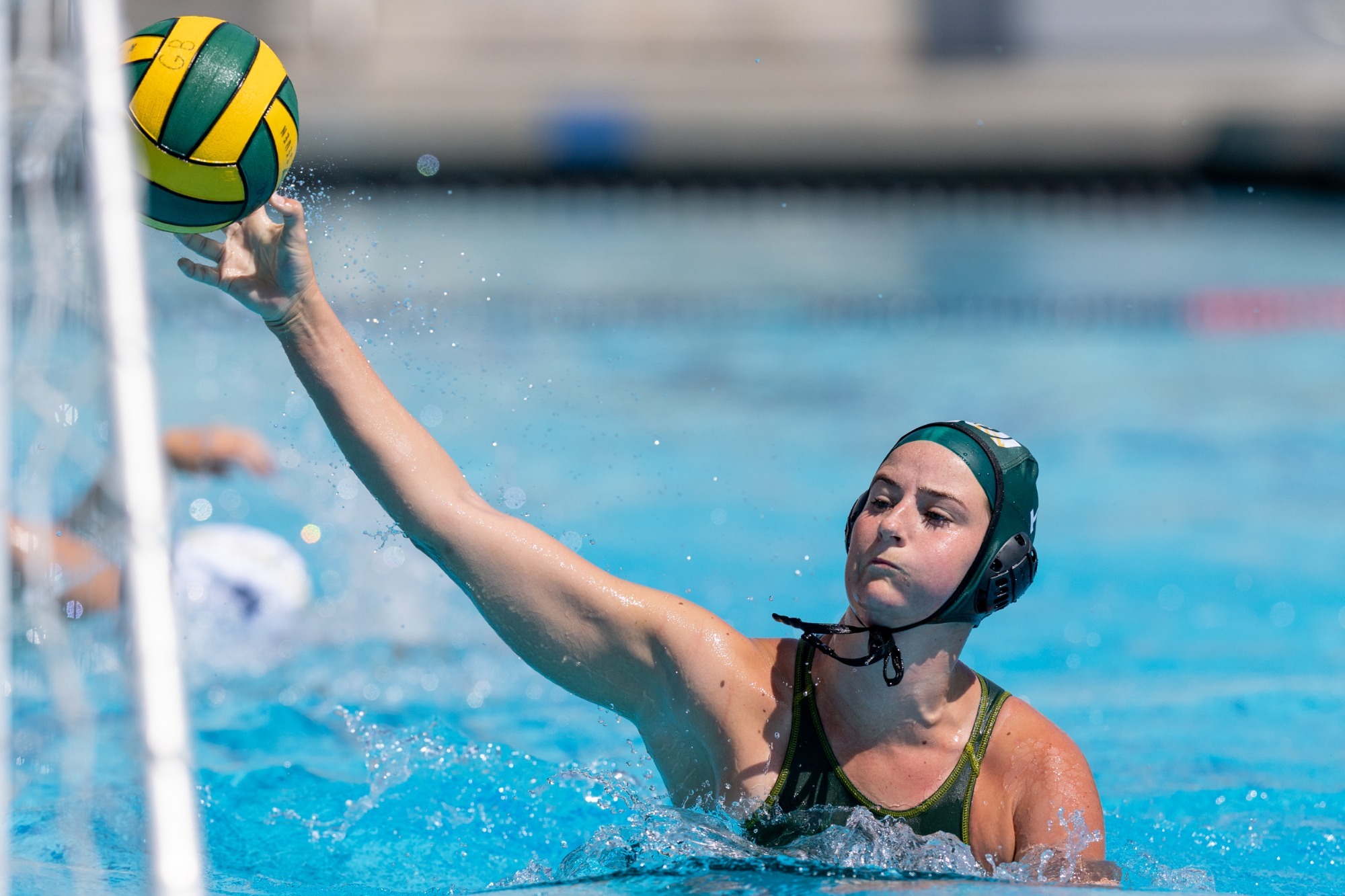 Mia Hueston firing a shot vs UC Merced