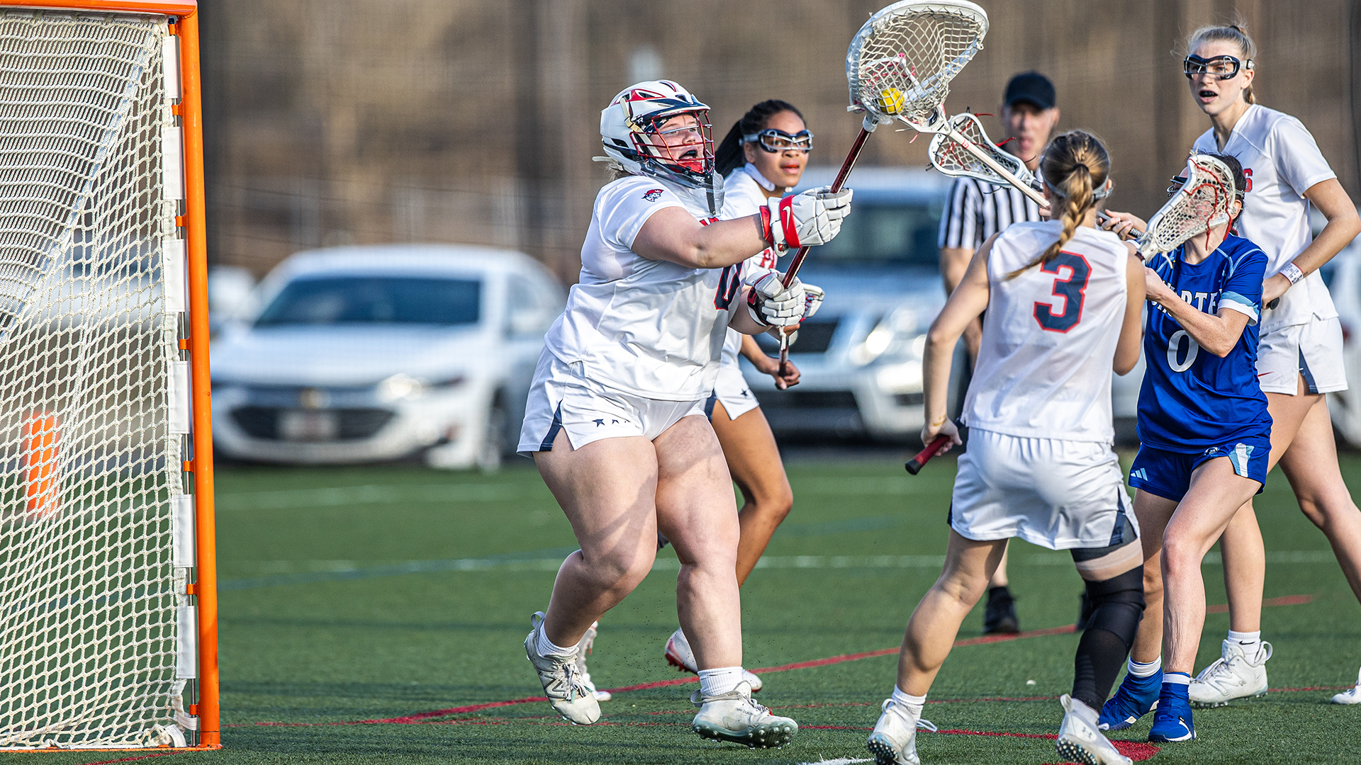 Goalie Mikayla Kimsey grabbing the ball out of the air for a save