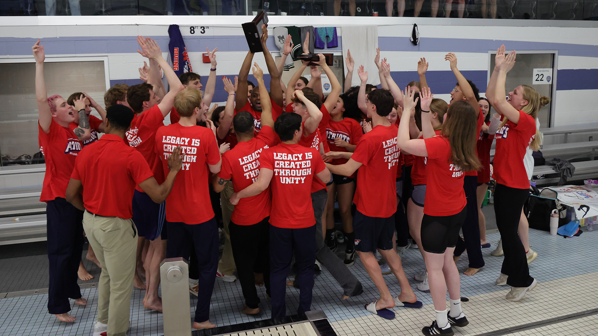 Swimming team celebrating