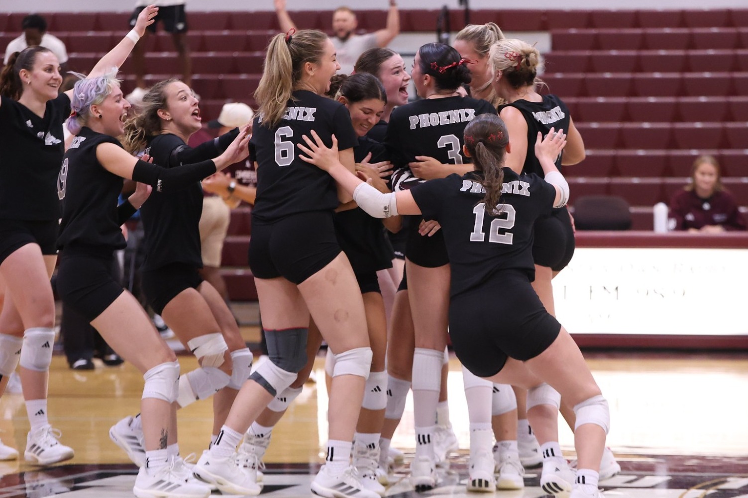 WVB Celebrates Comeback Win over CIU