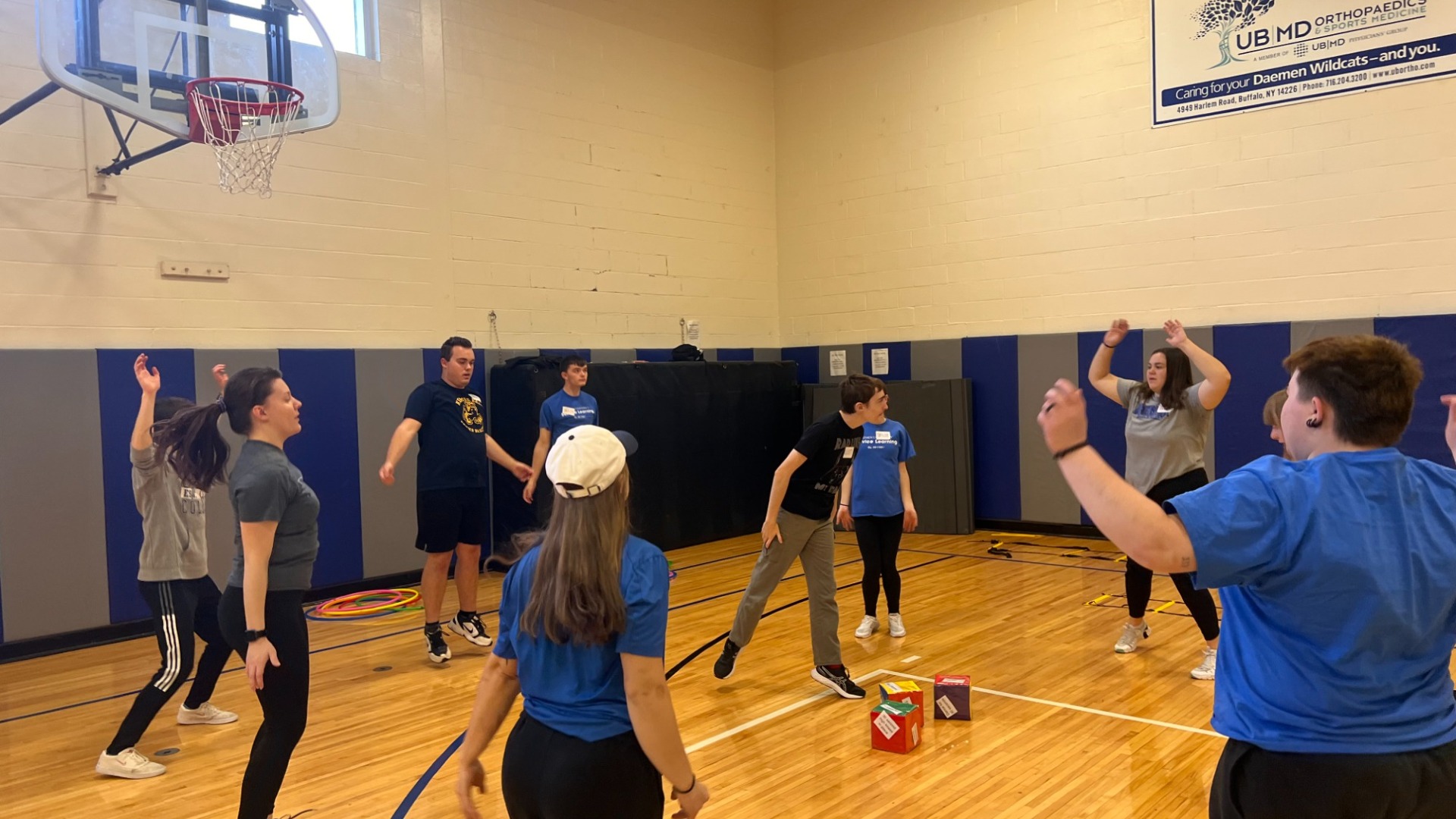 CAUSE participants do jumping jacks at our fitness session