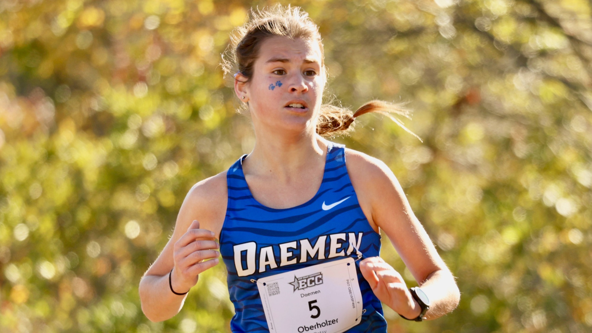 Patsy Oberholzer runs at the 2025 ECC Championships where she placed 6th to lead Daemen