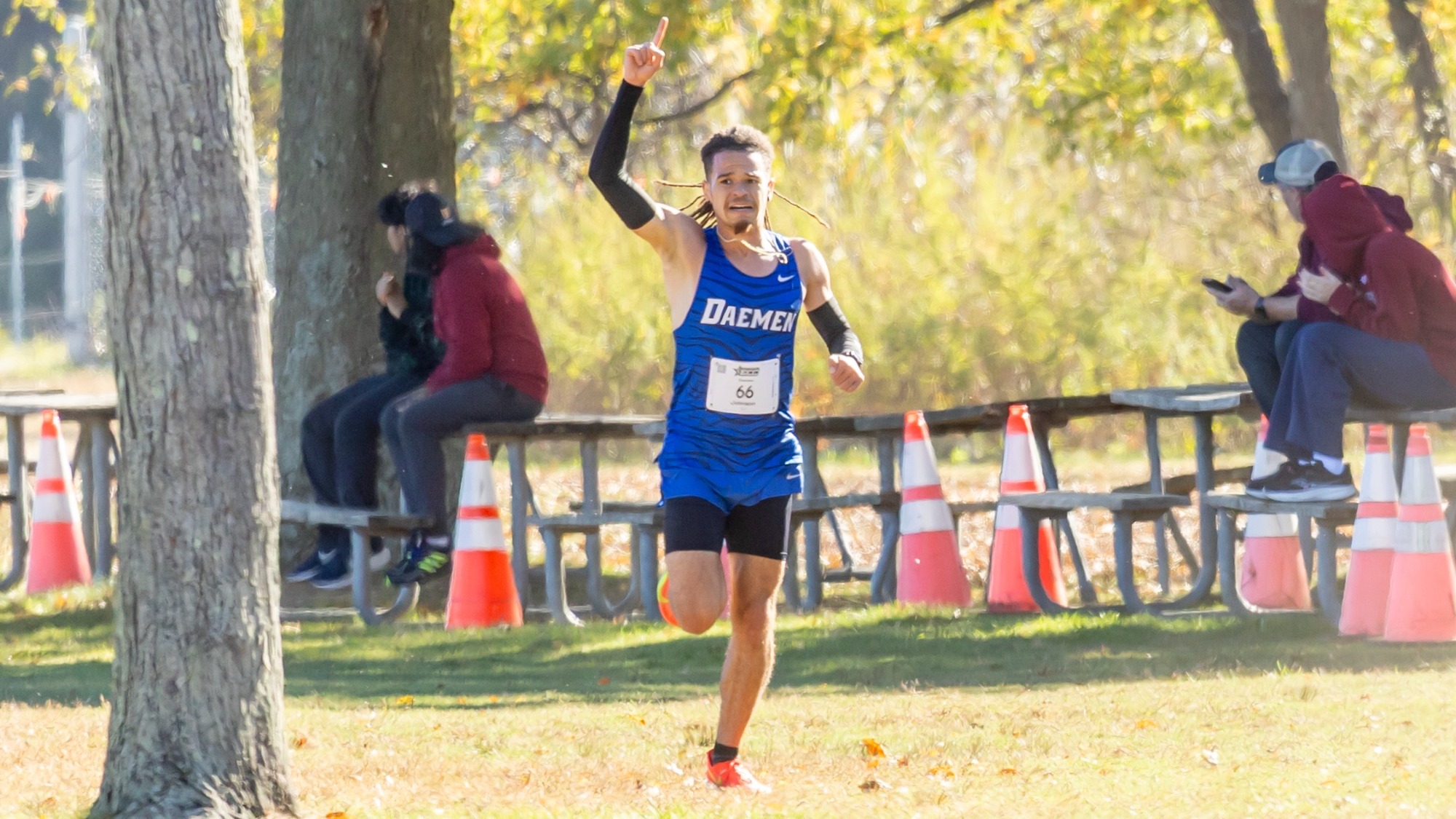 CJ Johnson runs to the finish line at the 2025 ECC Cross Country Championships