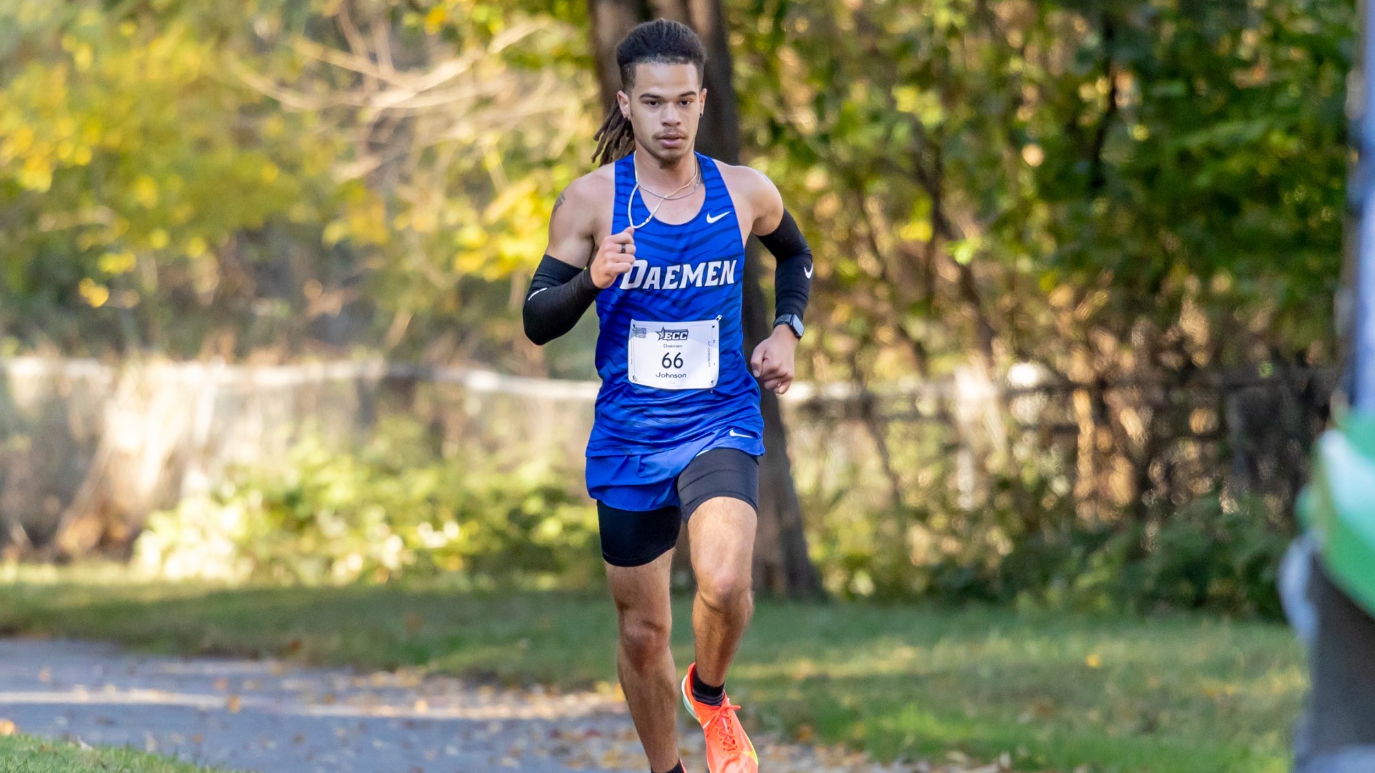 CJ Johnson runs in a colleagiate cross country race for Daemen