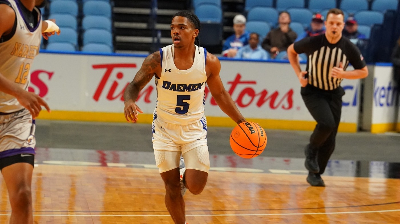 Justin Glover dribbles up the courr