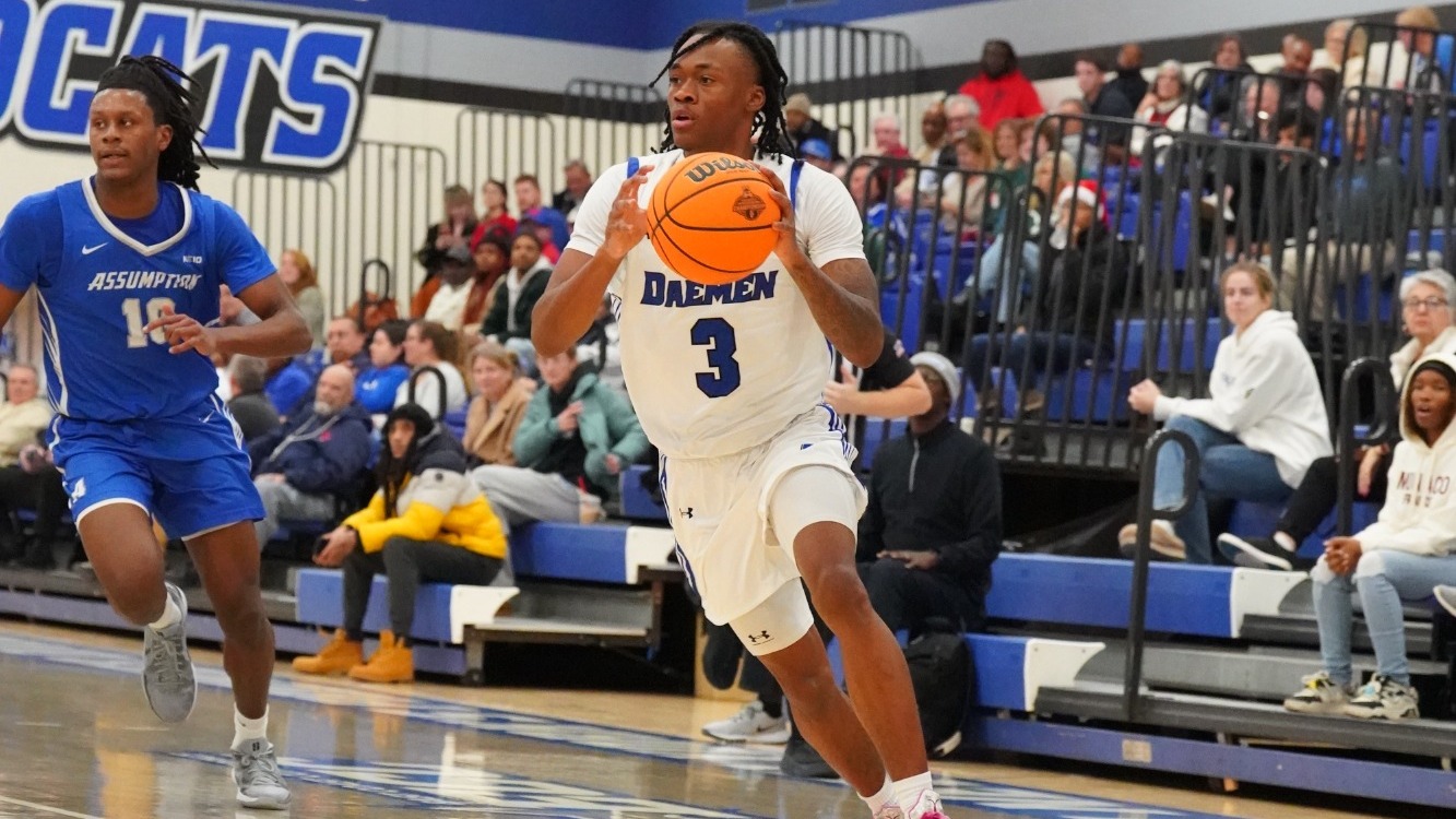 Nakyhi Harris dribbles past an Assumption defender