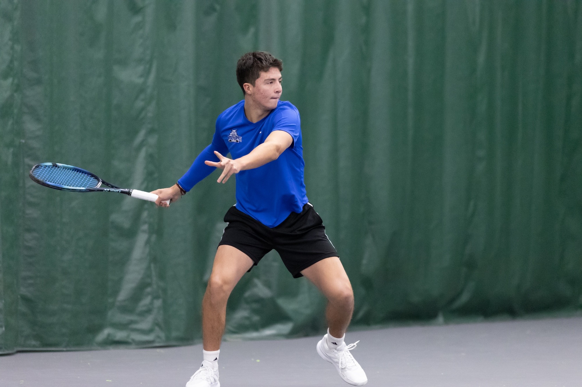 Lucas Garcia swings at a ball against Walsh
