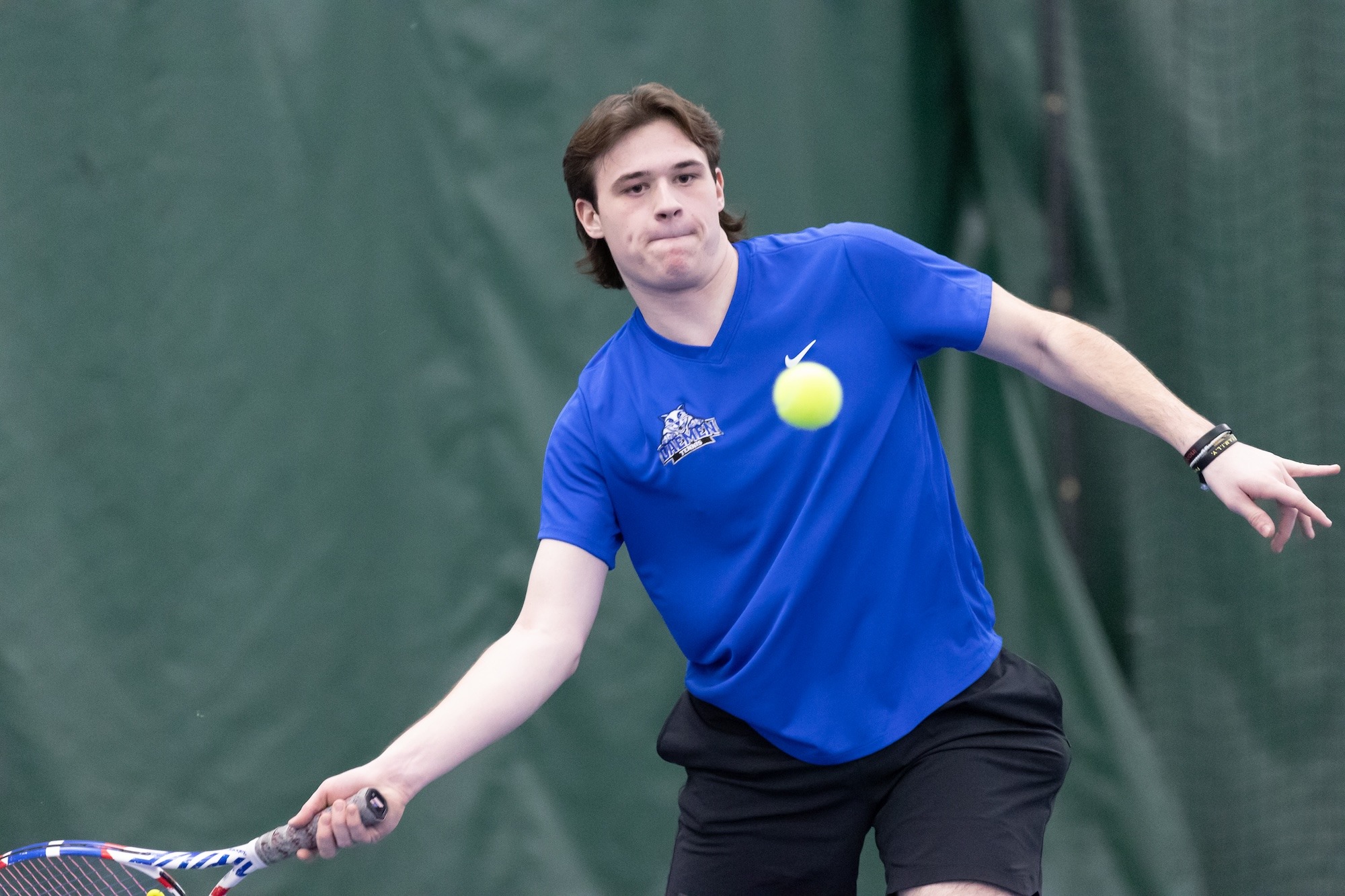 Vondin Henderson swings at a ball against RIT