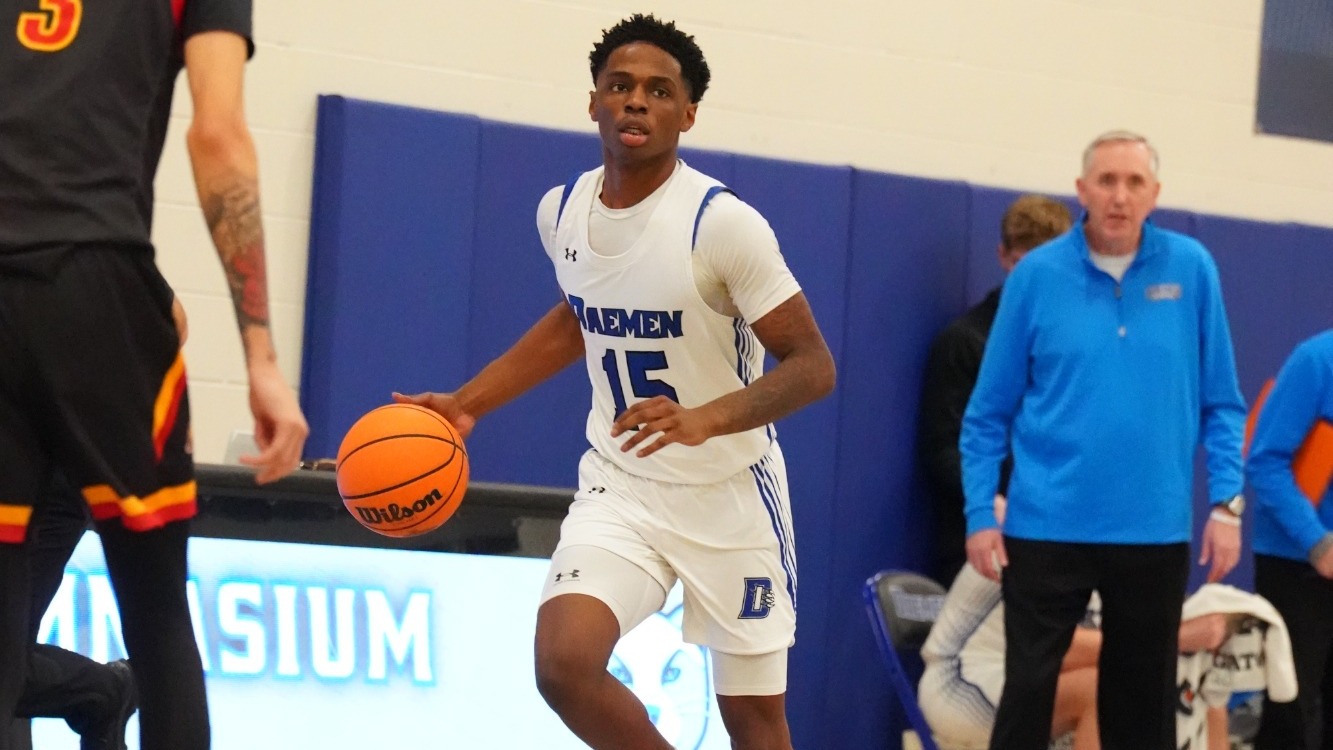 Jaiden Harrison dribbles up the court 