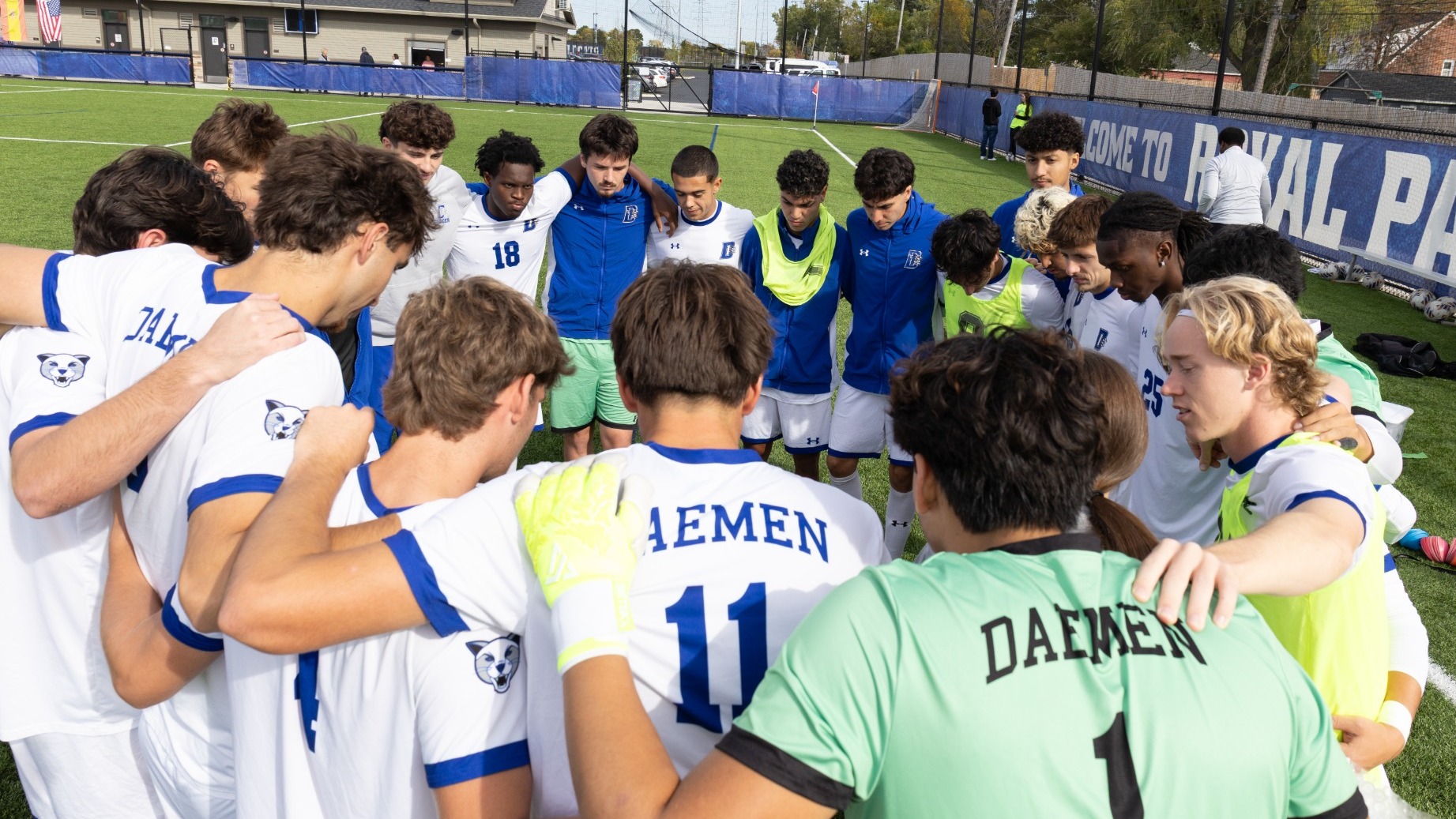 Men's soccer team huddle