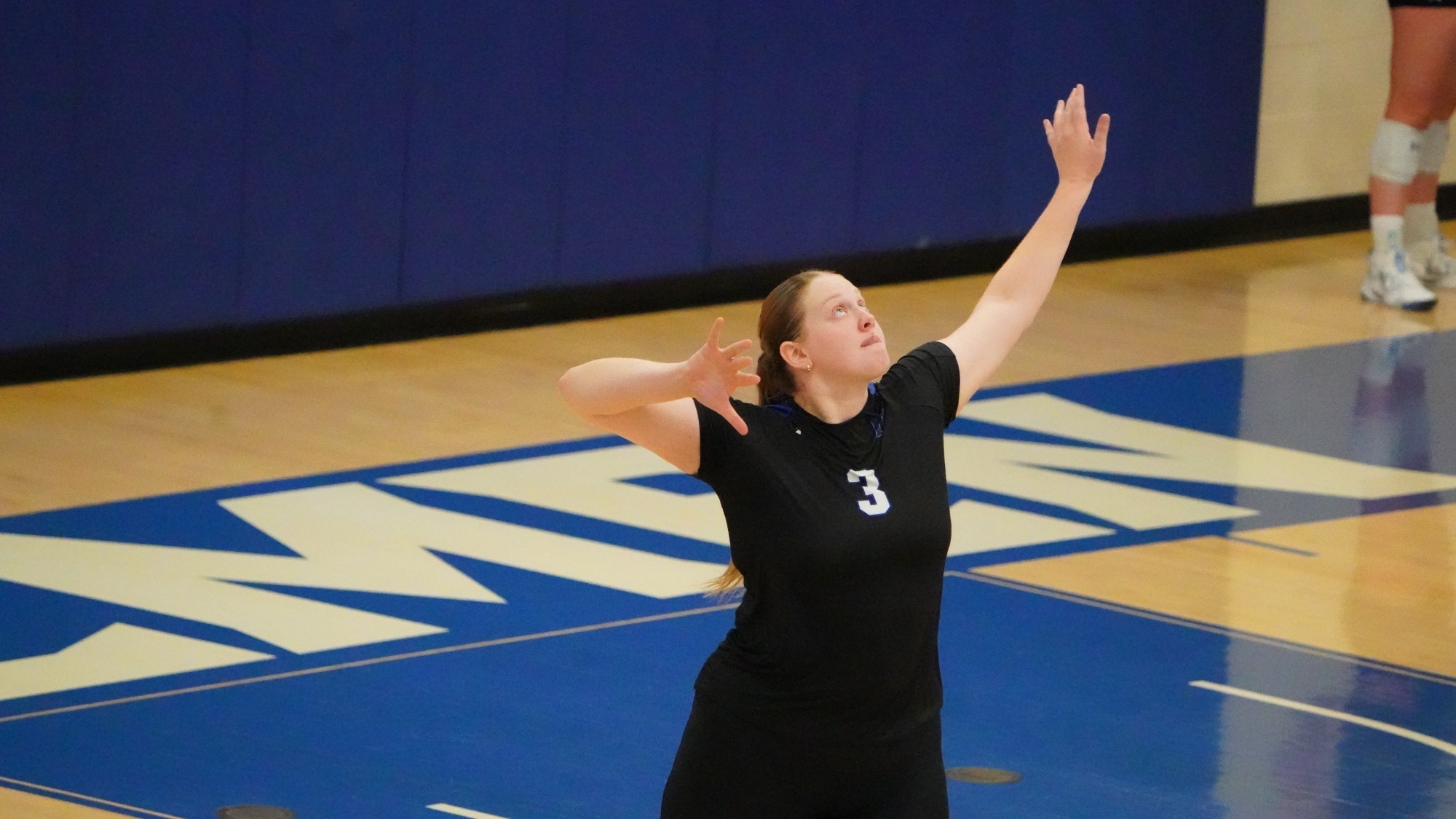 Maddie Schamaun serves 
