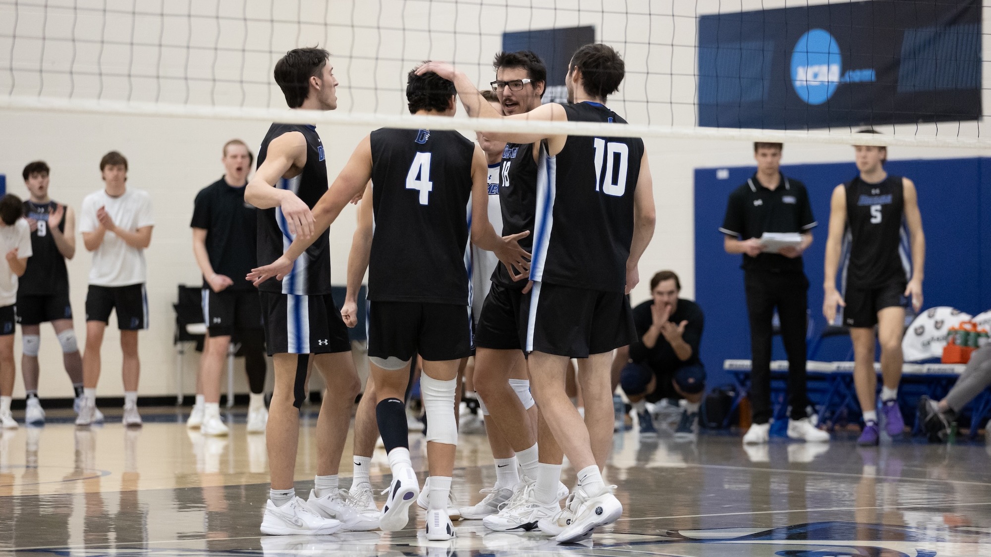 Men's volleyball huddle