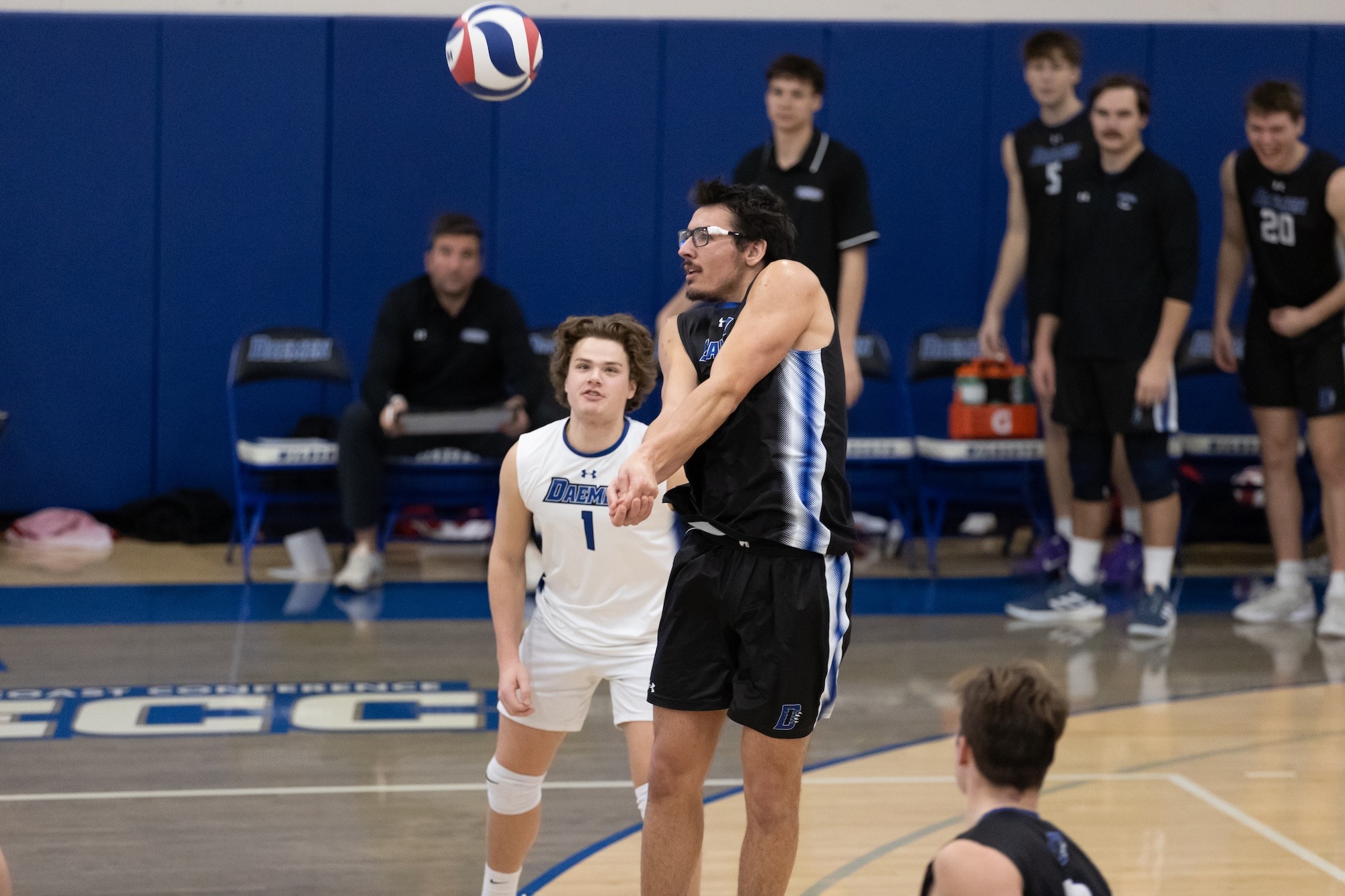 Billy Wieberg passes a ball against RWU