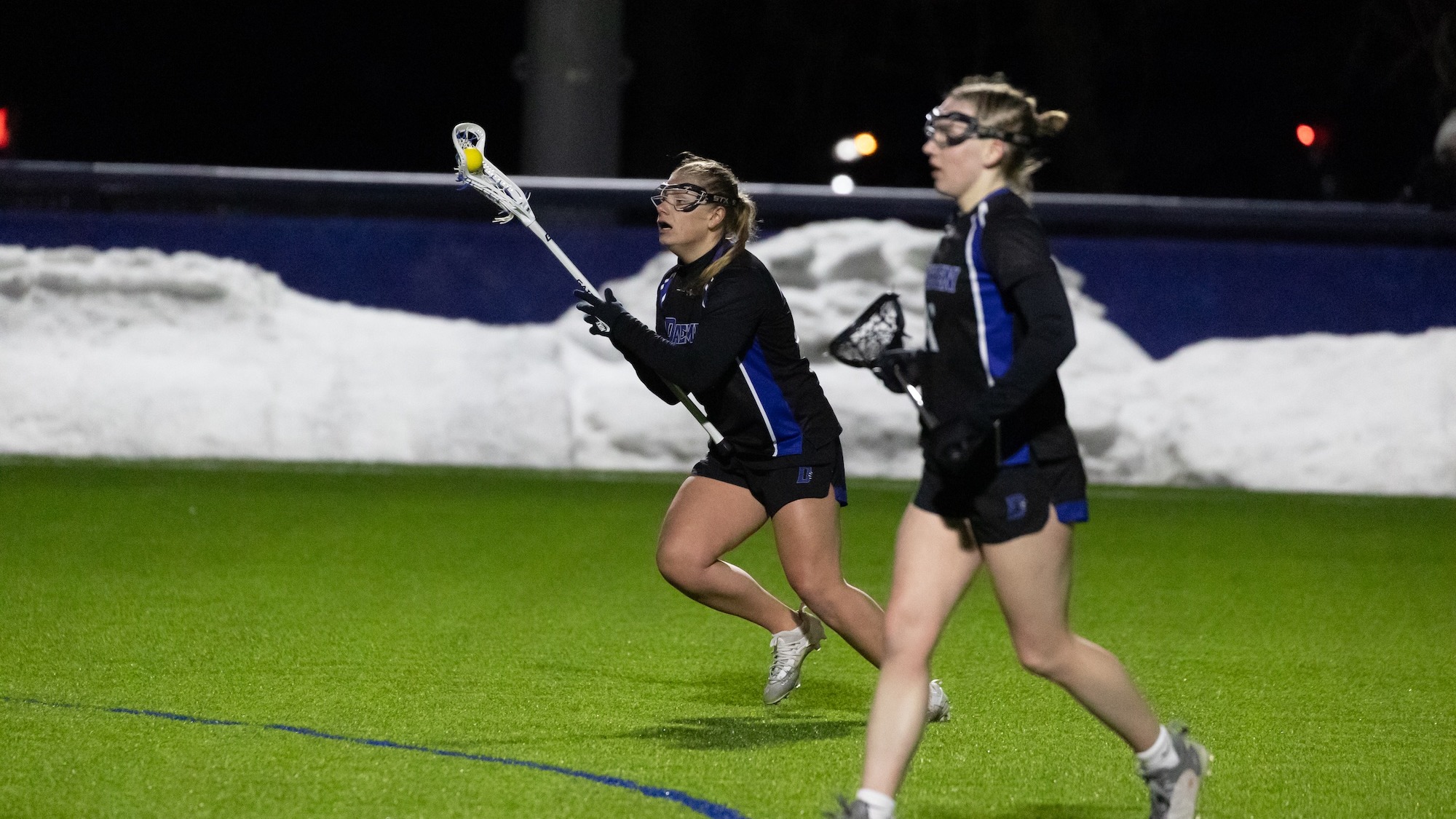 Avery Castner cradles the ball