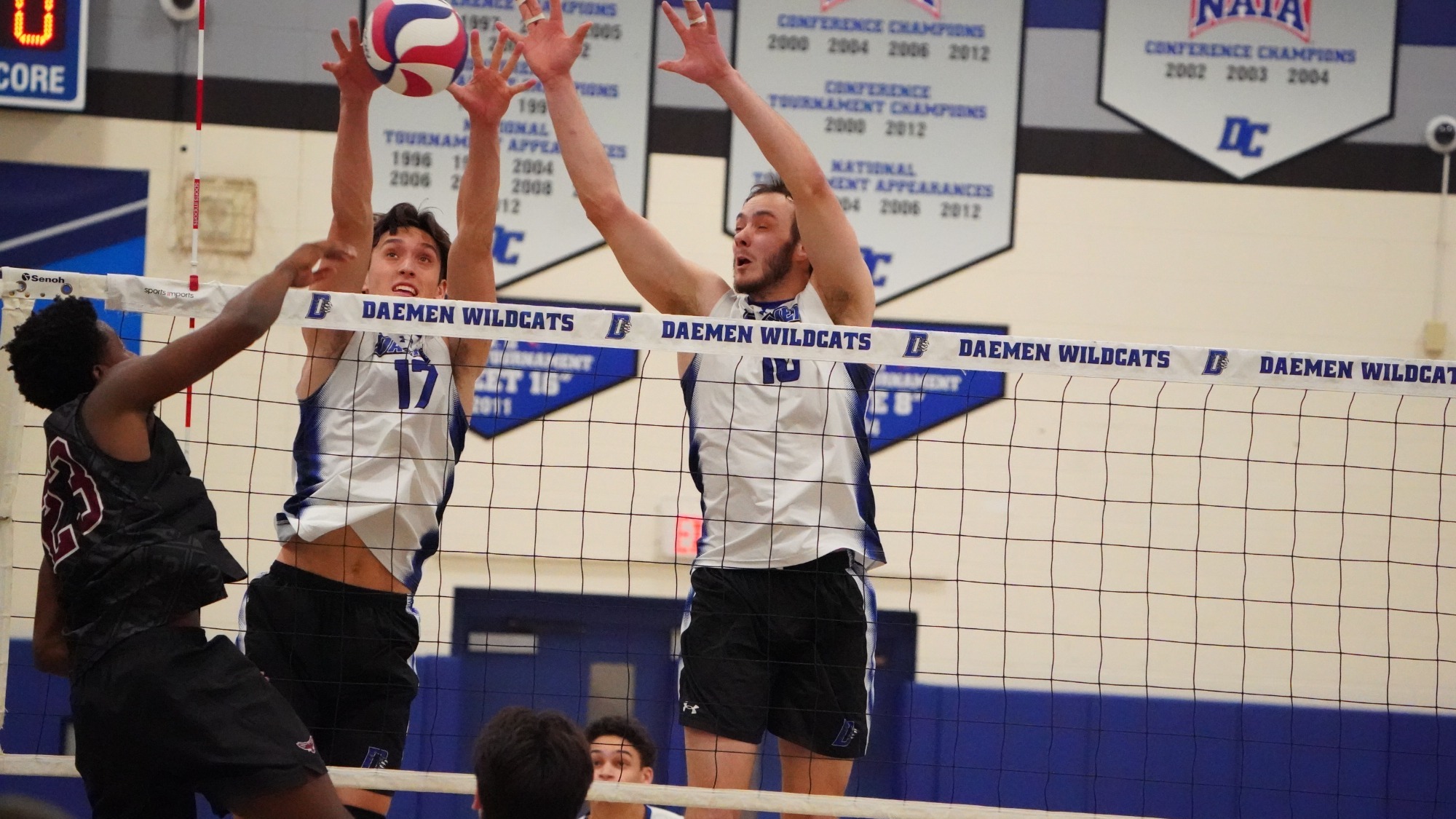 Patrick Mullen and Maverick O'Neill block against UMES