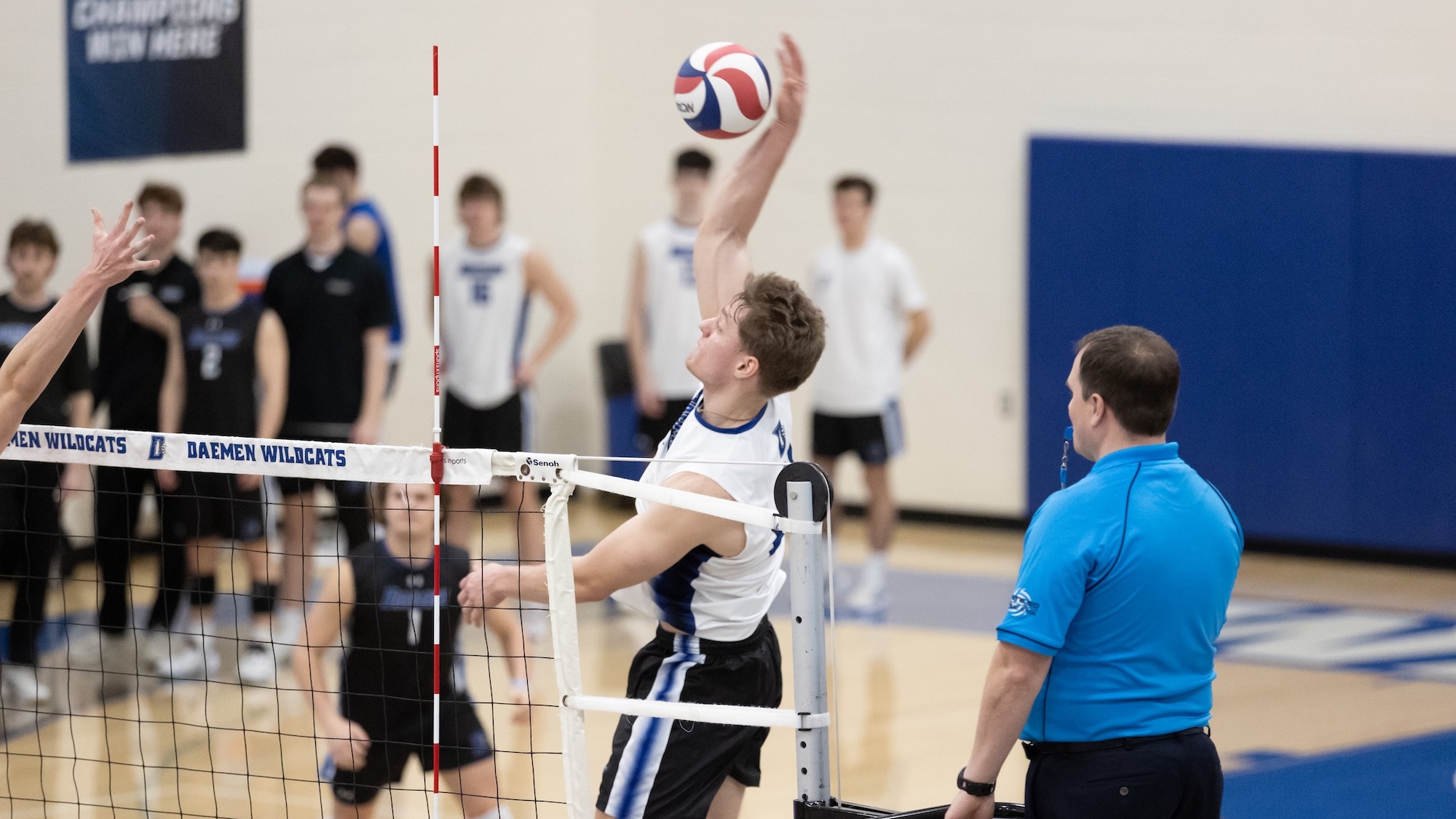Aidan White swings at a ball