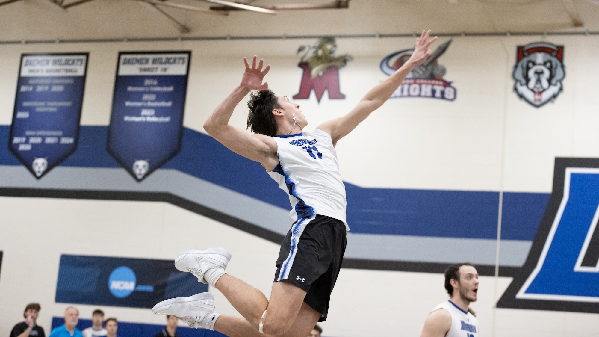 Patrick Mullen swings against Manhattan