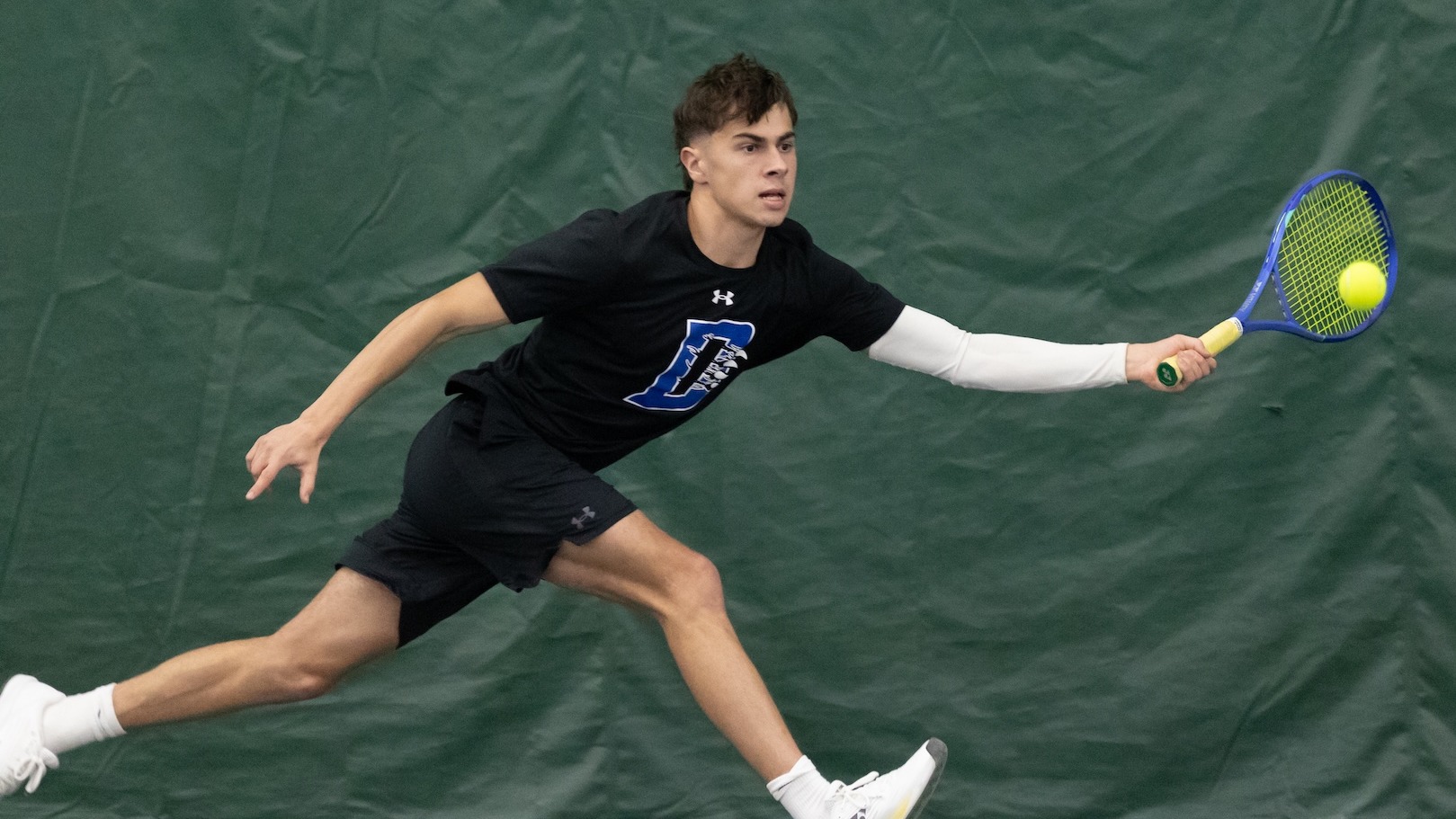 Mitch Pollack stretches out for a hit