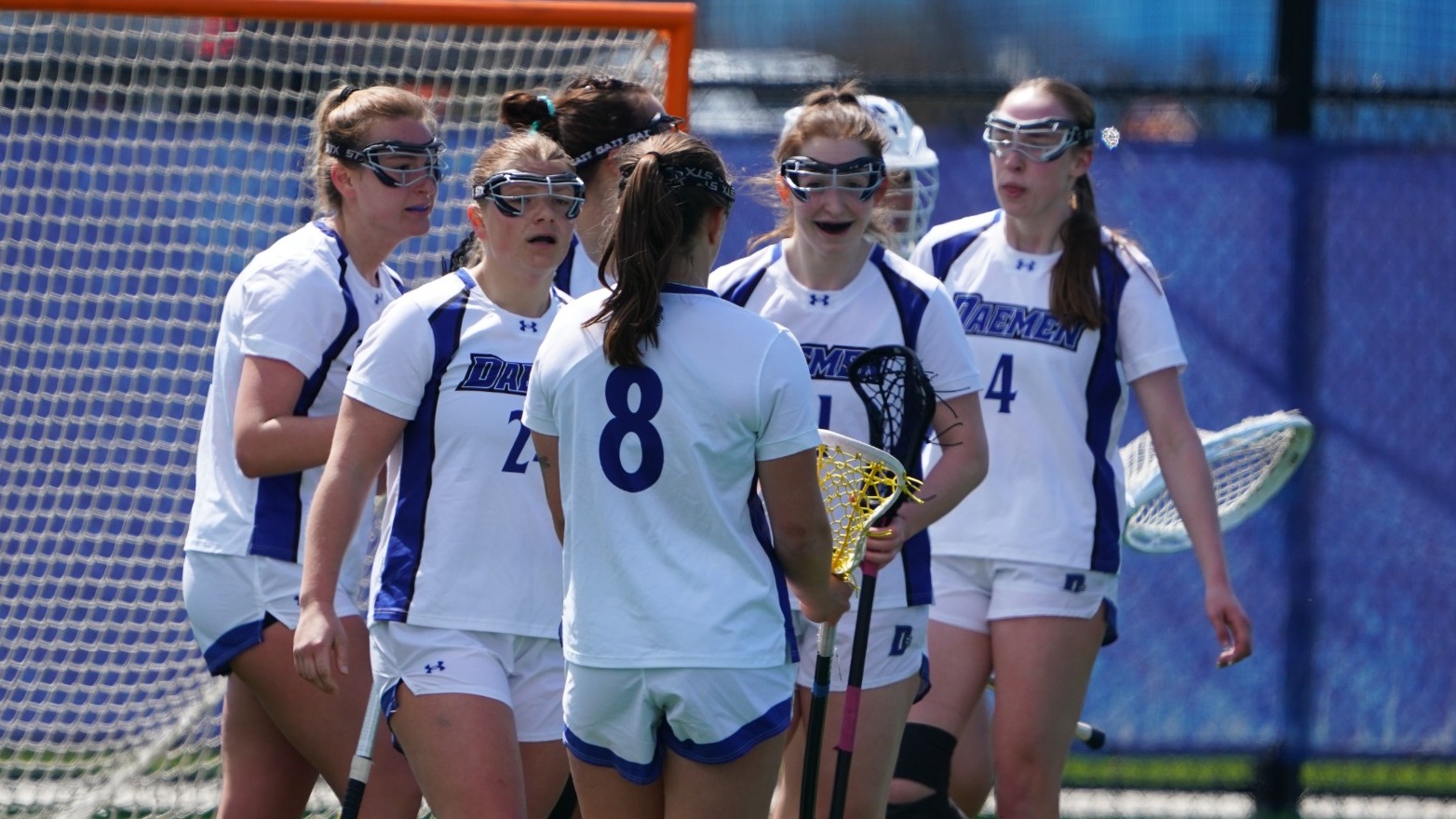 Women's lacorsse celebrates