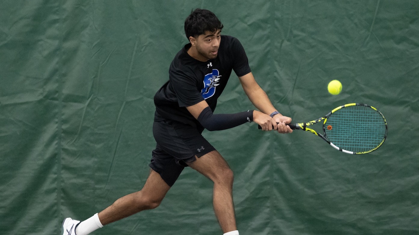 Rohan Chitanand swings at a ball