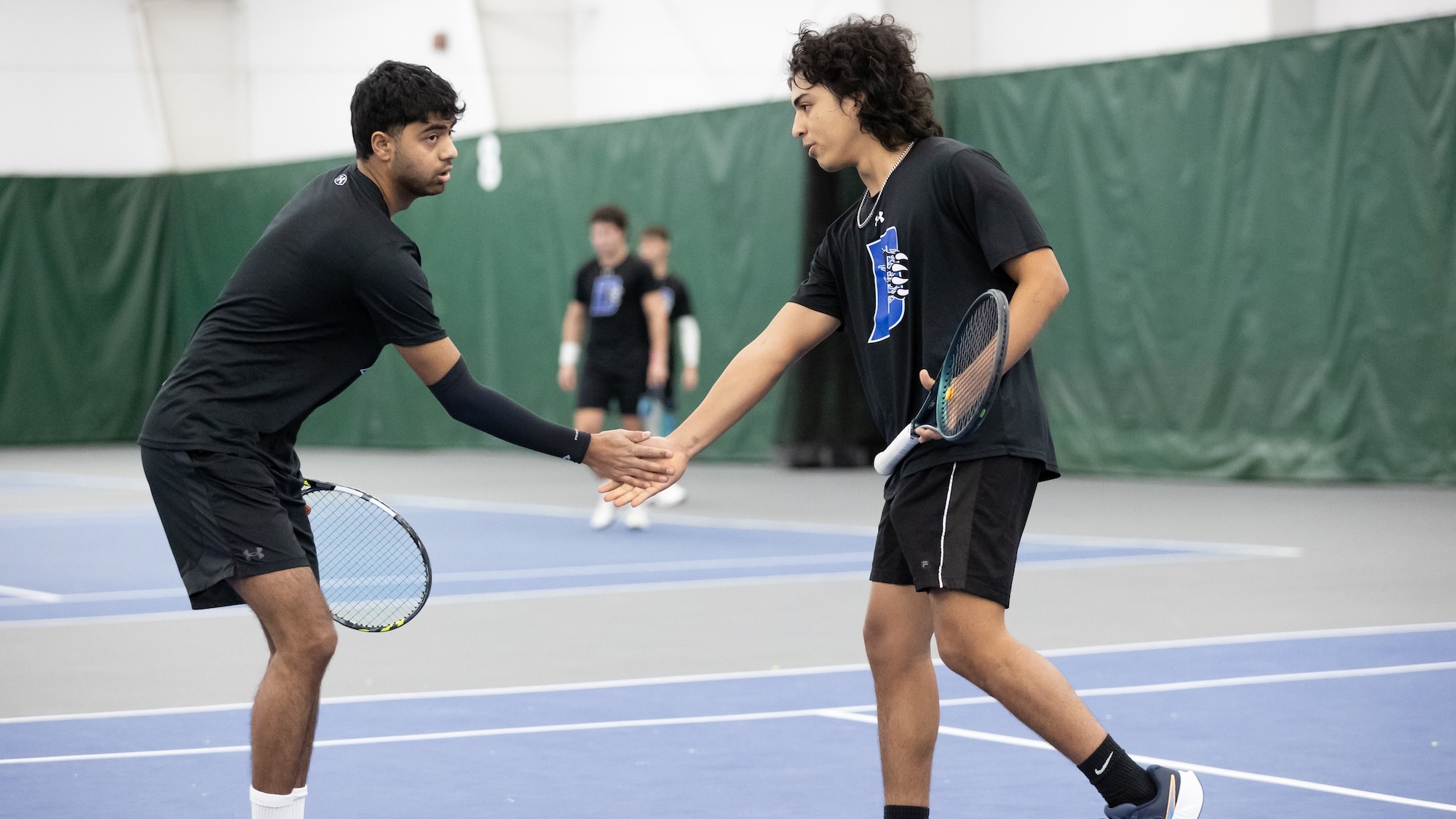 Rohan Chitanand and Pablo Viera shake hands