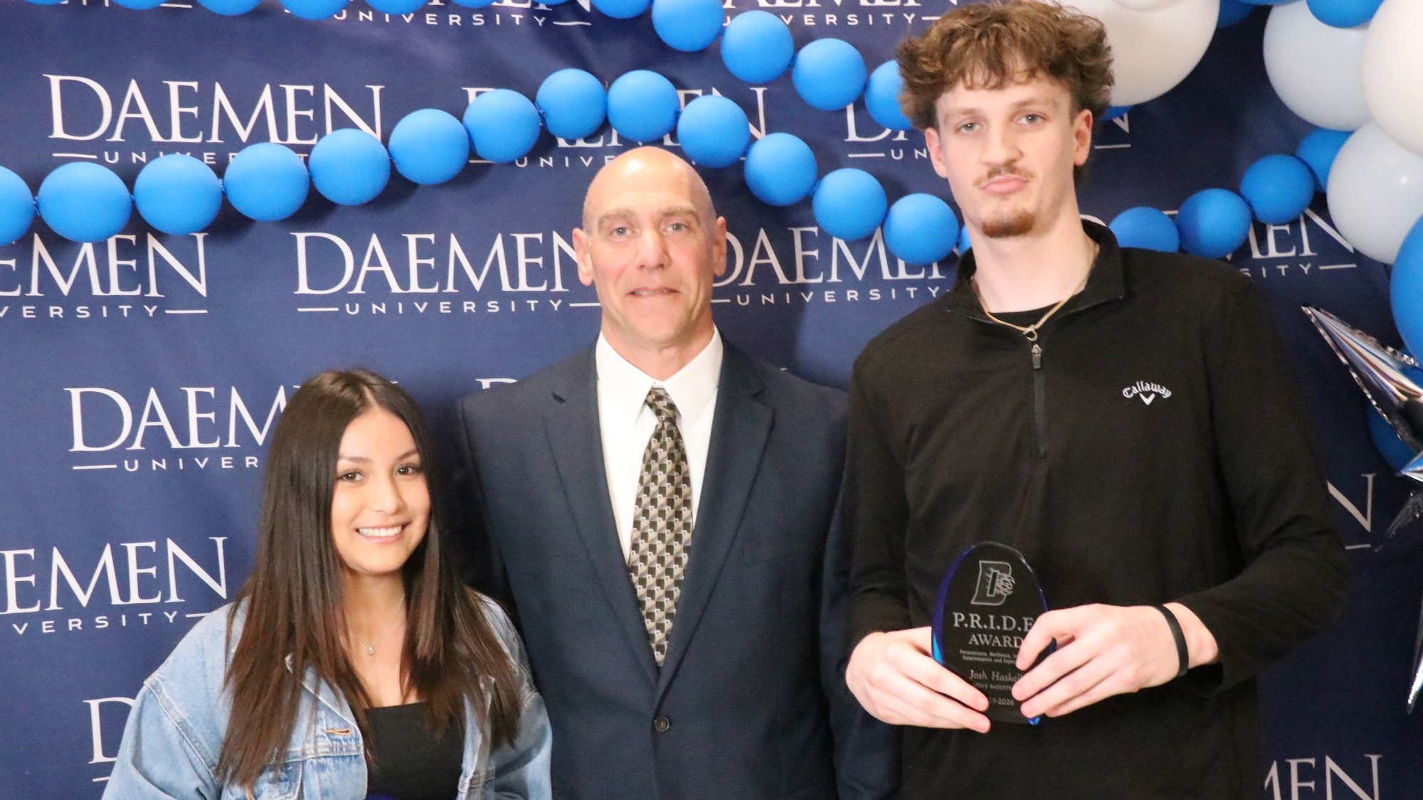 Allie O'Donnell, Jeff Sage and Josh Haskell with the P.R.I.D.E. Award