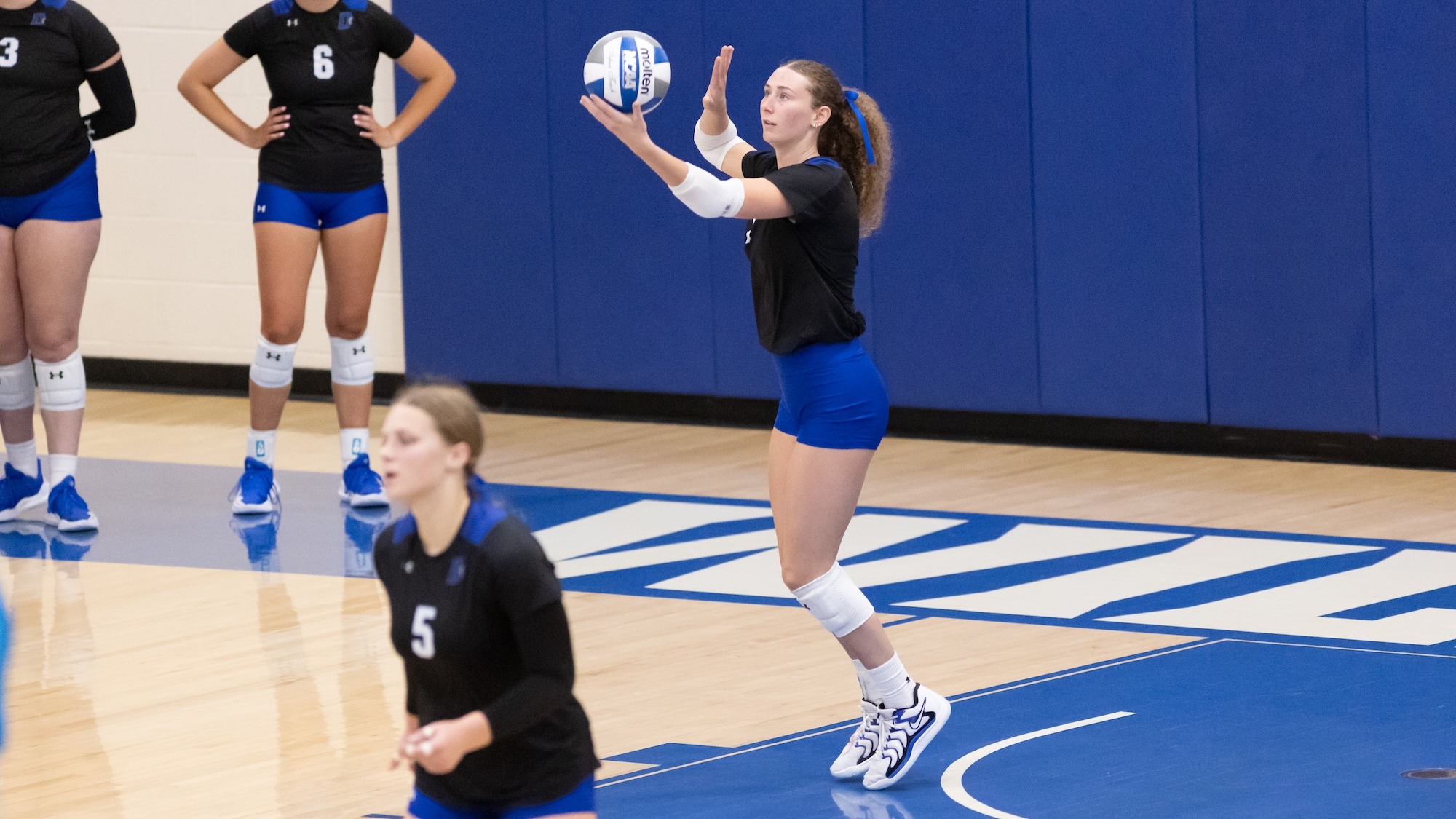 Molly Ryan serves 