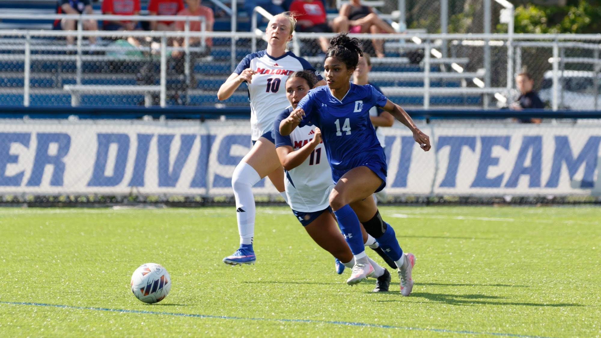 Mia Wright dribbles