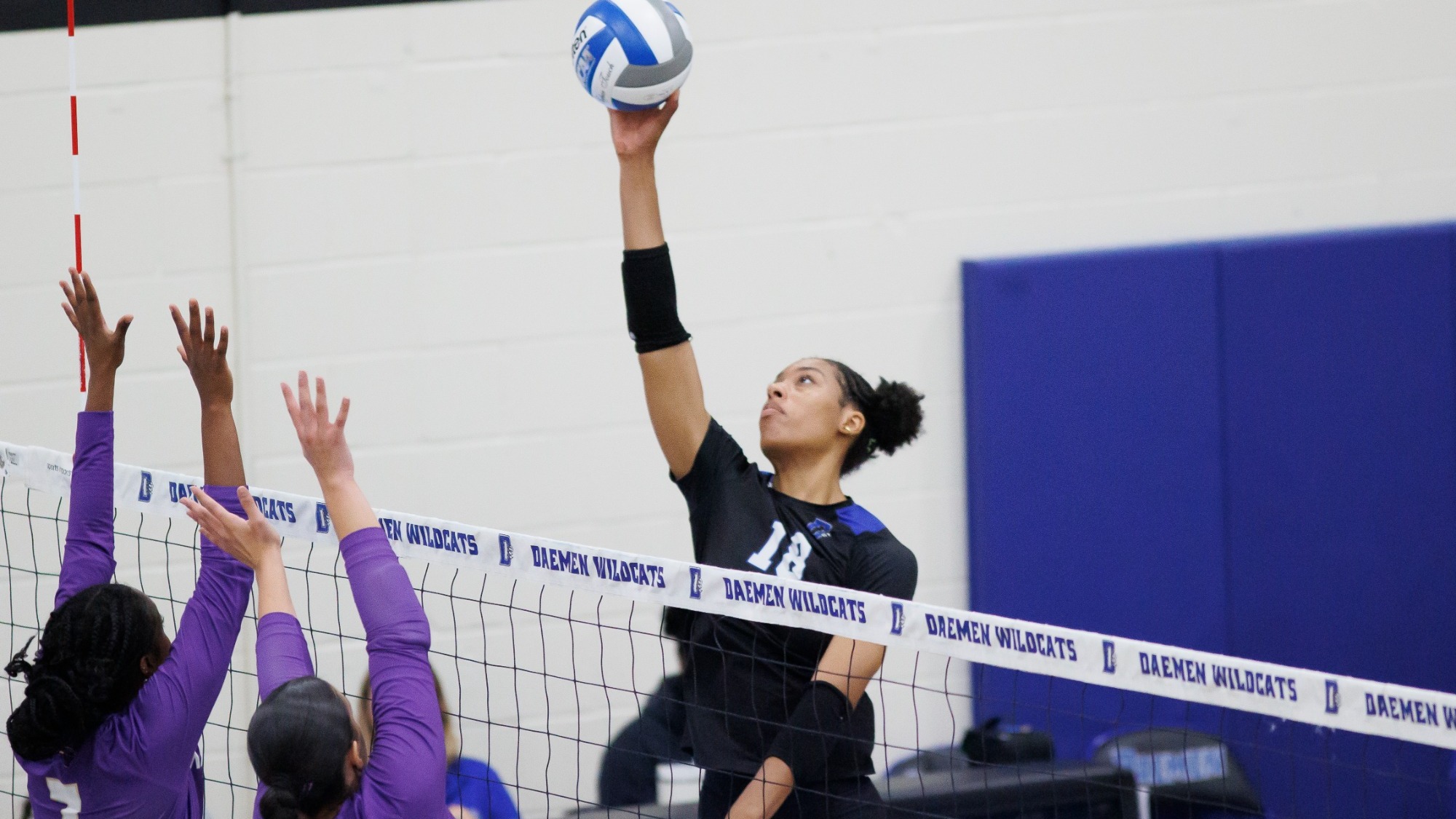 Mina Faw hits a ball against St. Michael's