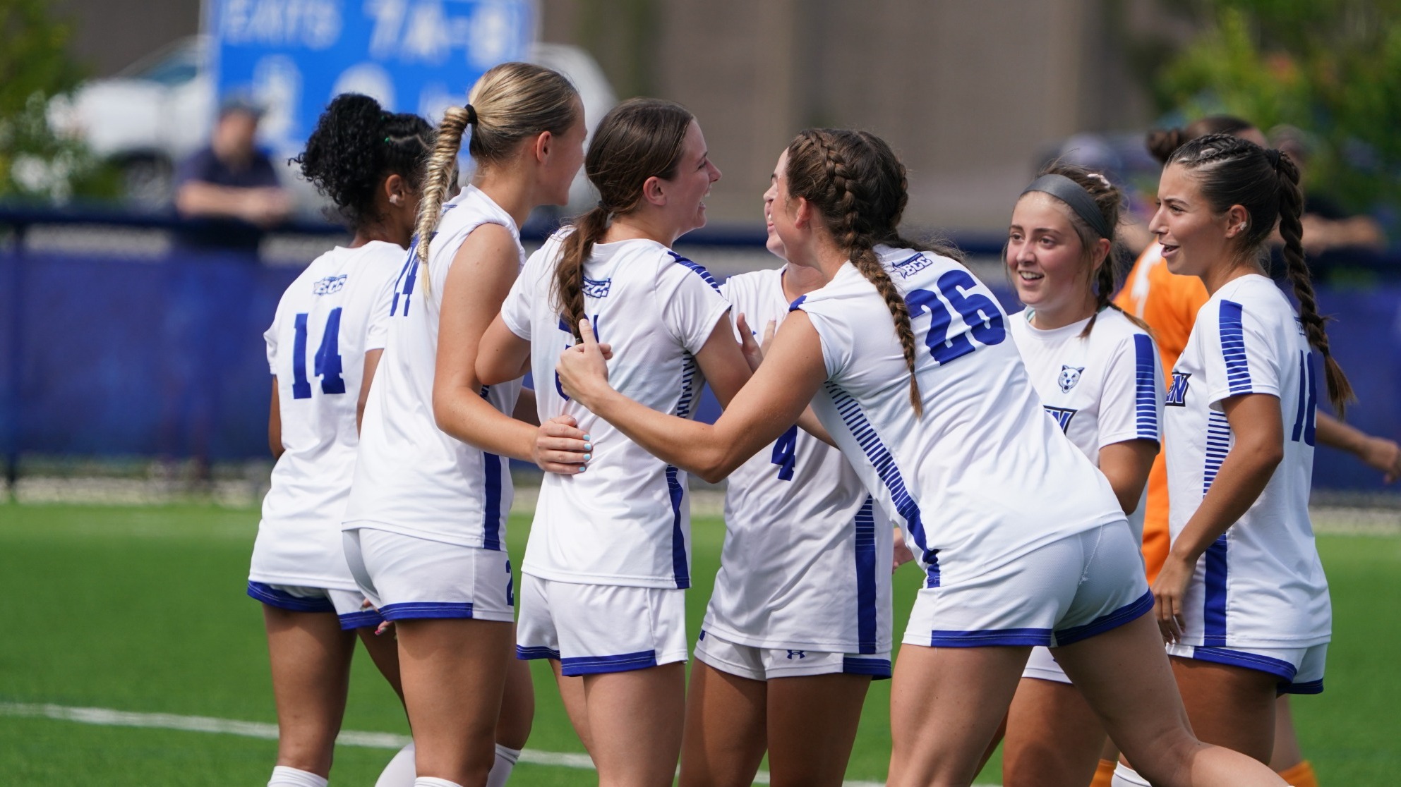 Women's soccer group celebration
