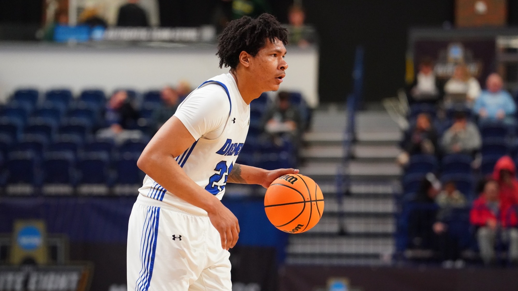 Justin Hemphill dribbles against Lander
