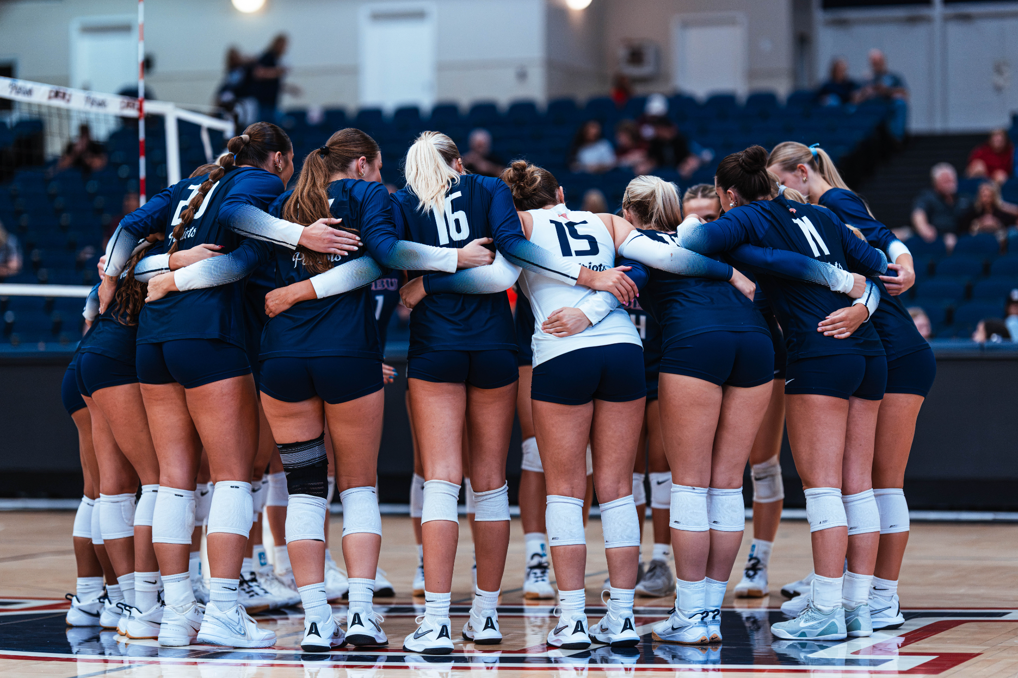 Volleyball Team Huddle