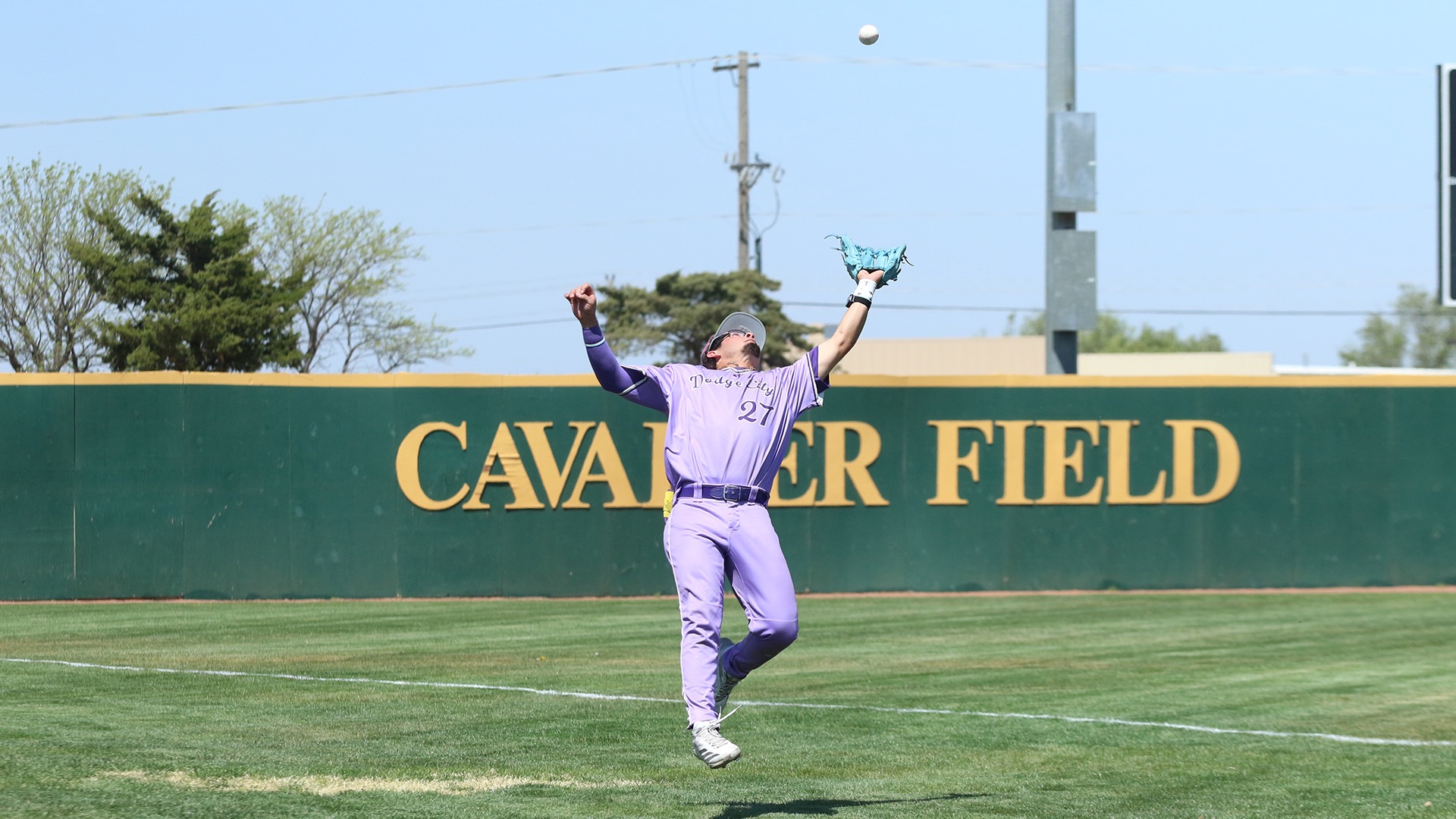 Dodge City Baseball player, Will Soto with a great catch in foul territory against Seward County