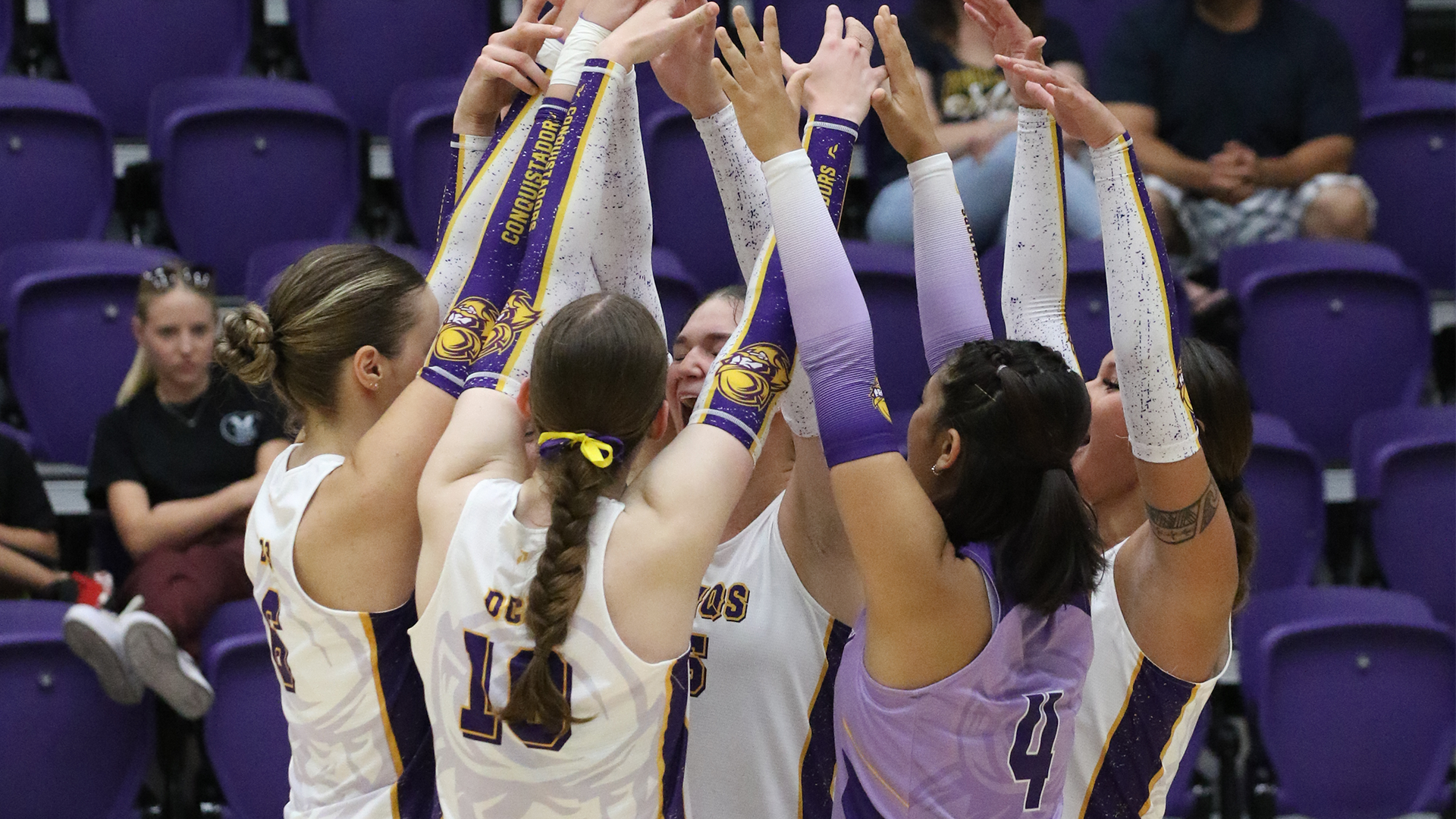 Dodge City CC volleyball celebrating after a win 